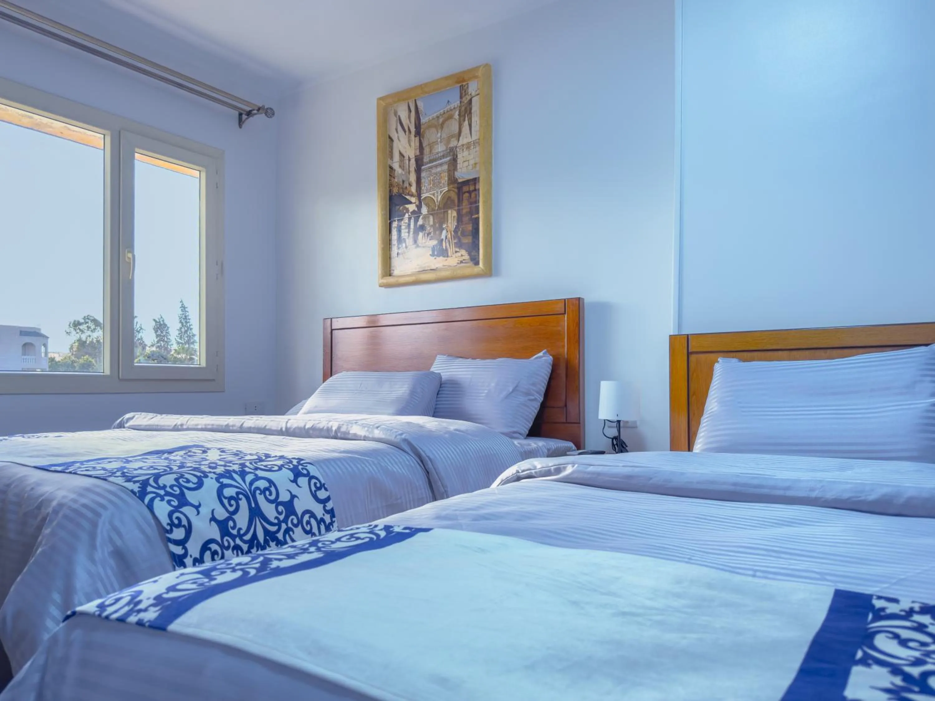 Bed in Royal Crown Hotel Giza Pyramids View