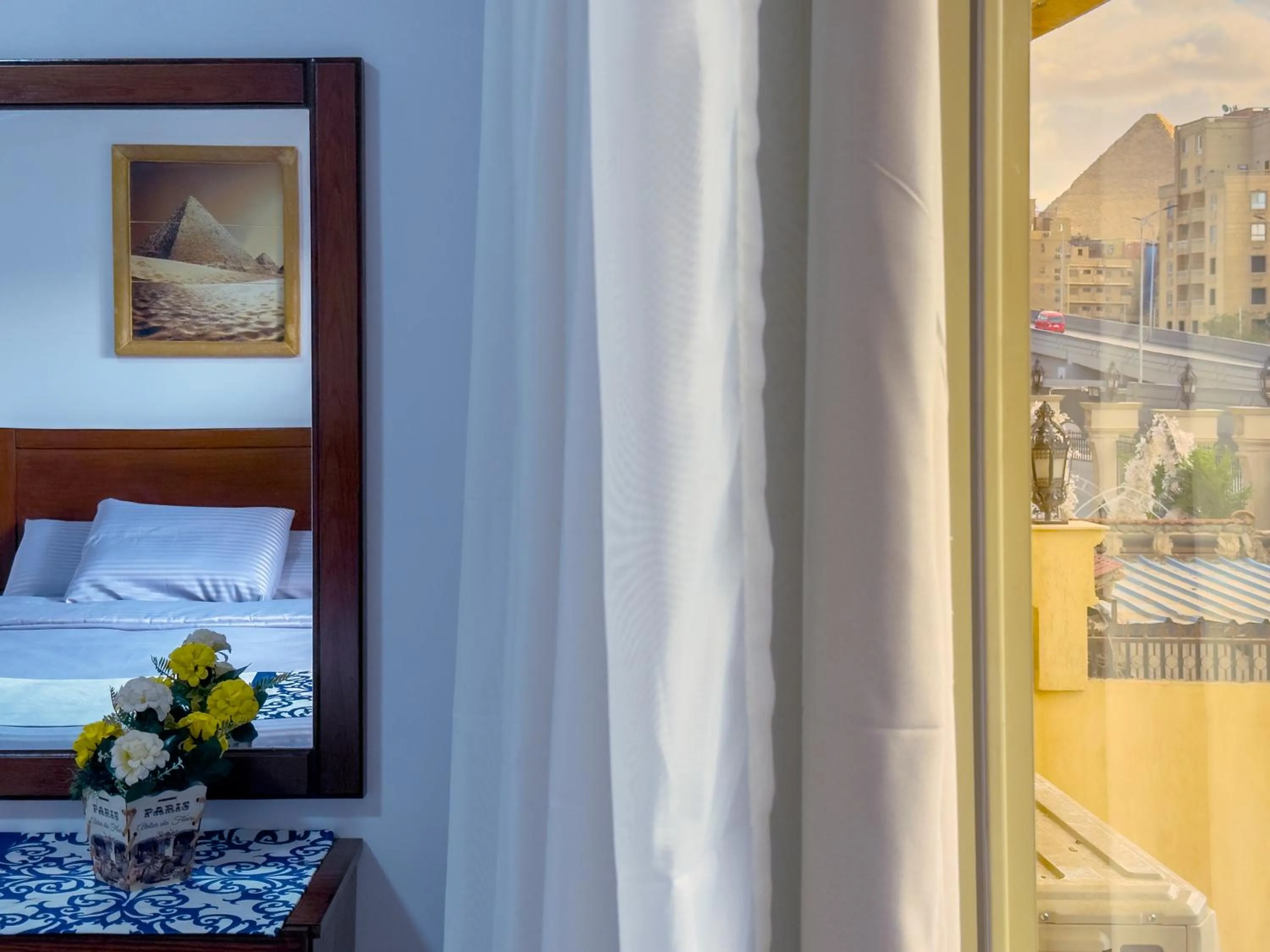 Bed in Royal Crown Hotel Giza Pyramids View