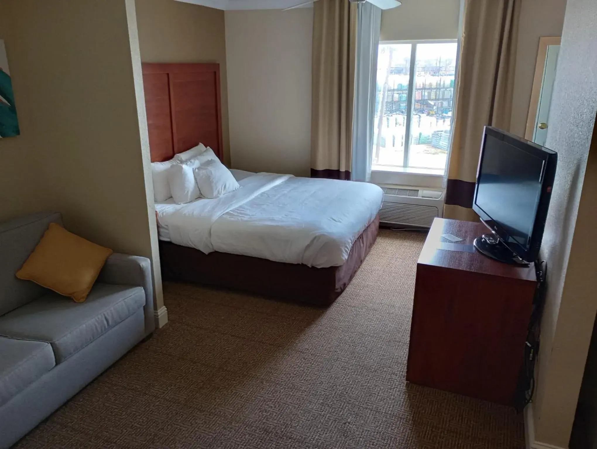 Deluxe King Suite in SAMIR Stay at NW Expressway Deluxe King Suite in SAMIR Stay at NW Expressway