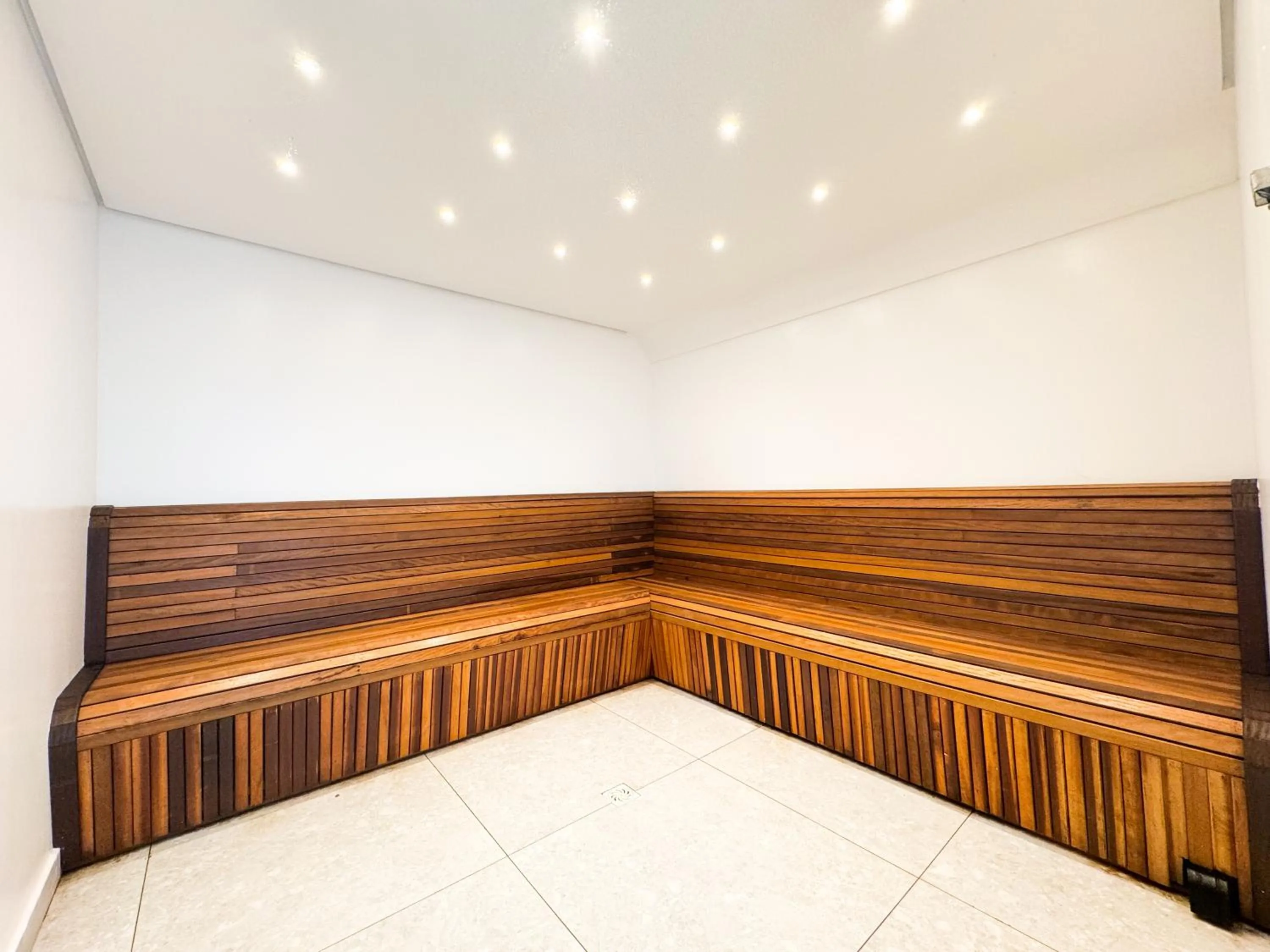 Steam room, Bed in Blue Sea Hotel