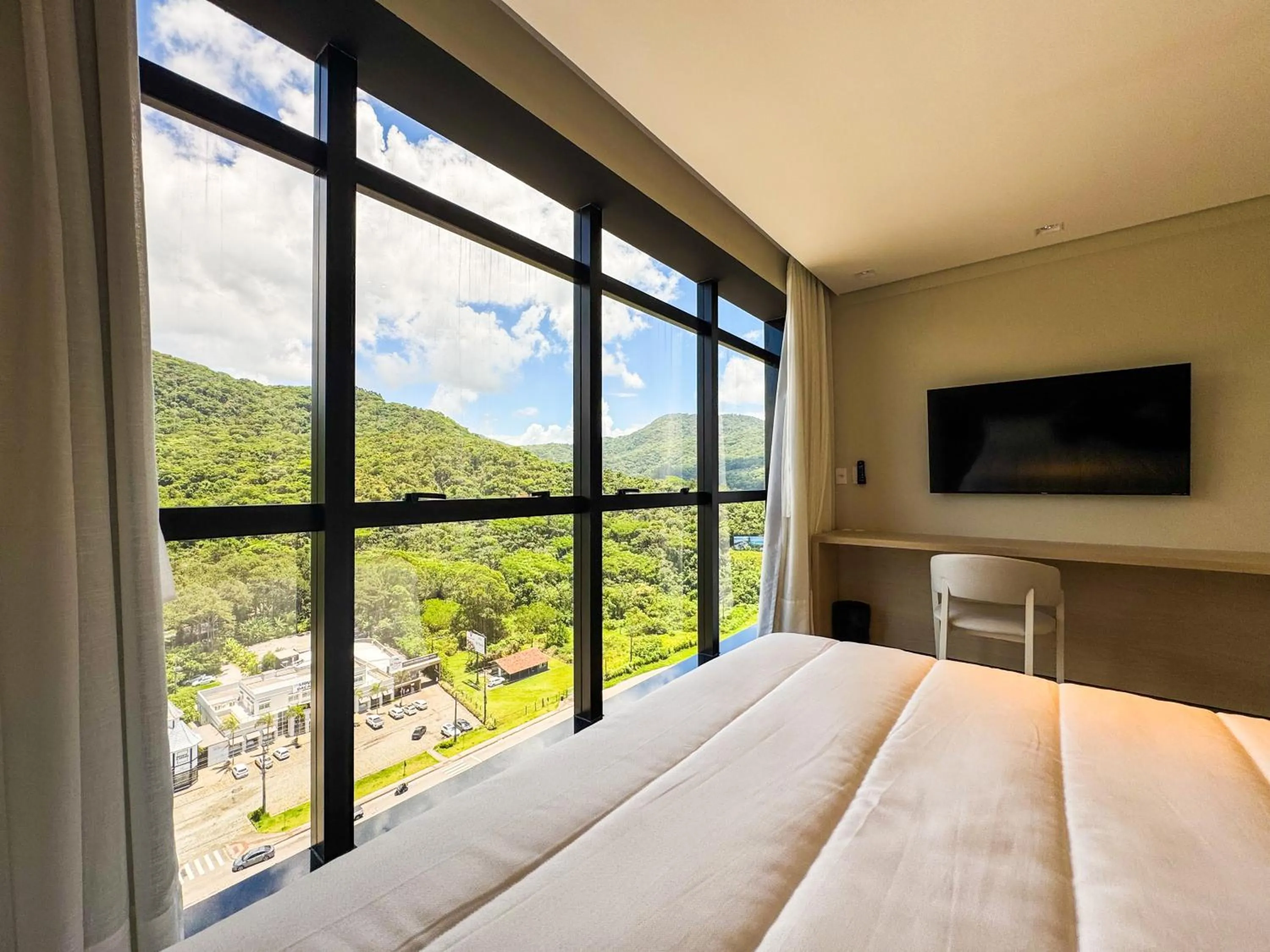 View (from property/room), Bed in Blue Sea Hotel