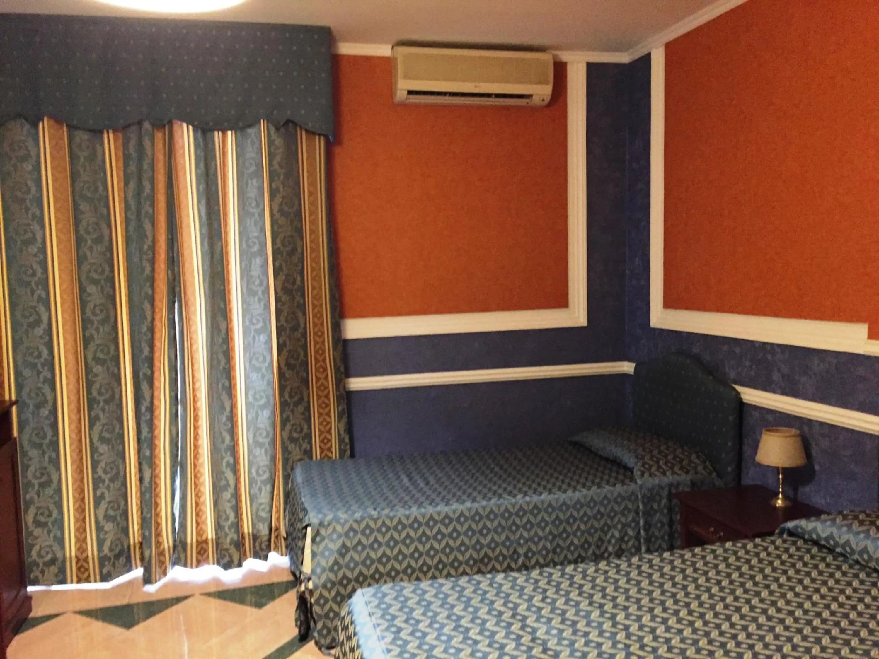 Bed in Hotel Excelsior