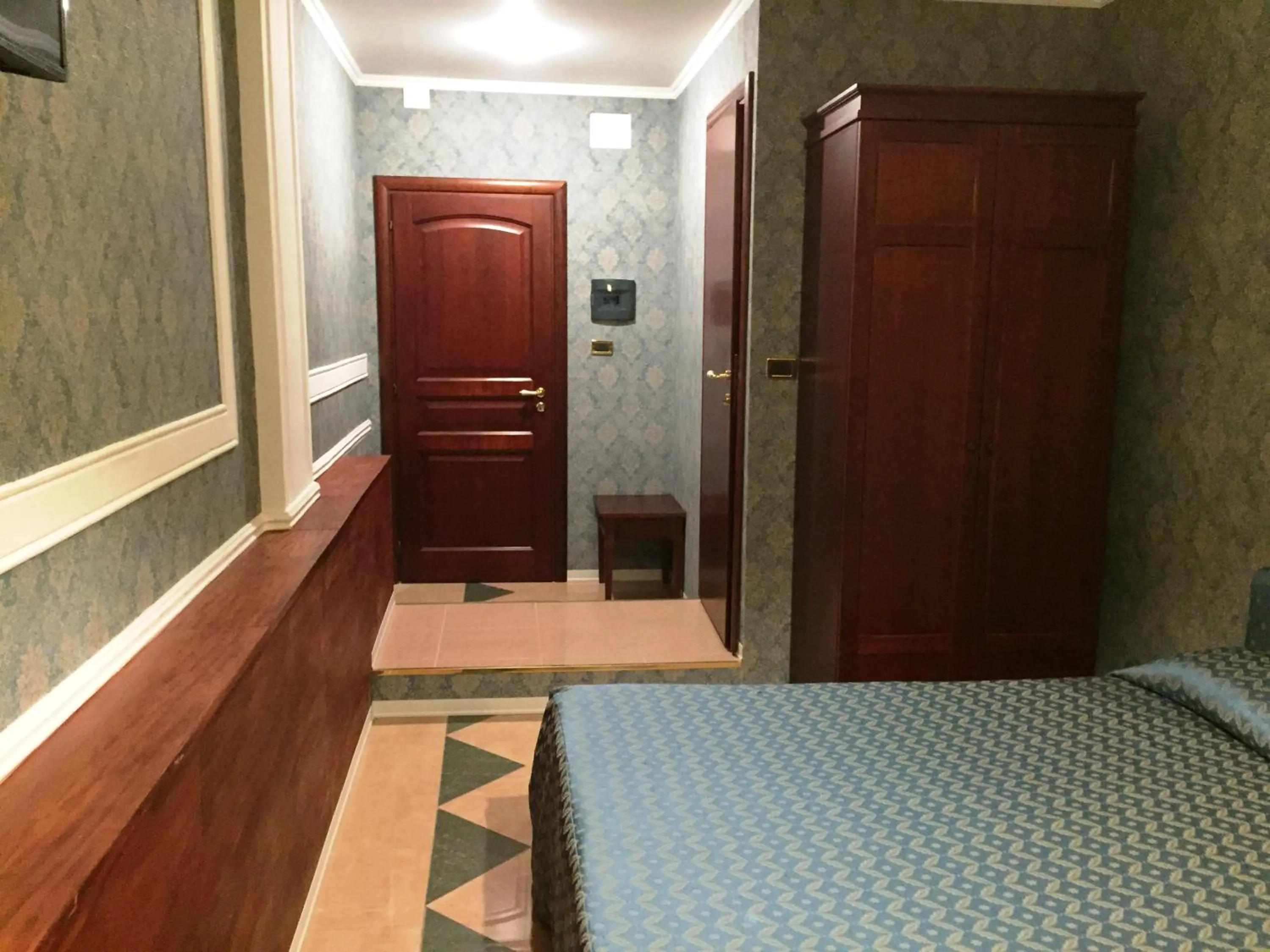 Bed in Hotel Excelsior