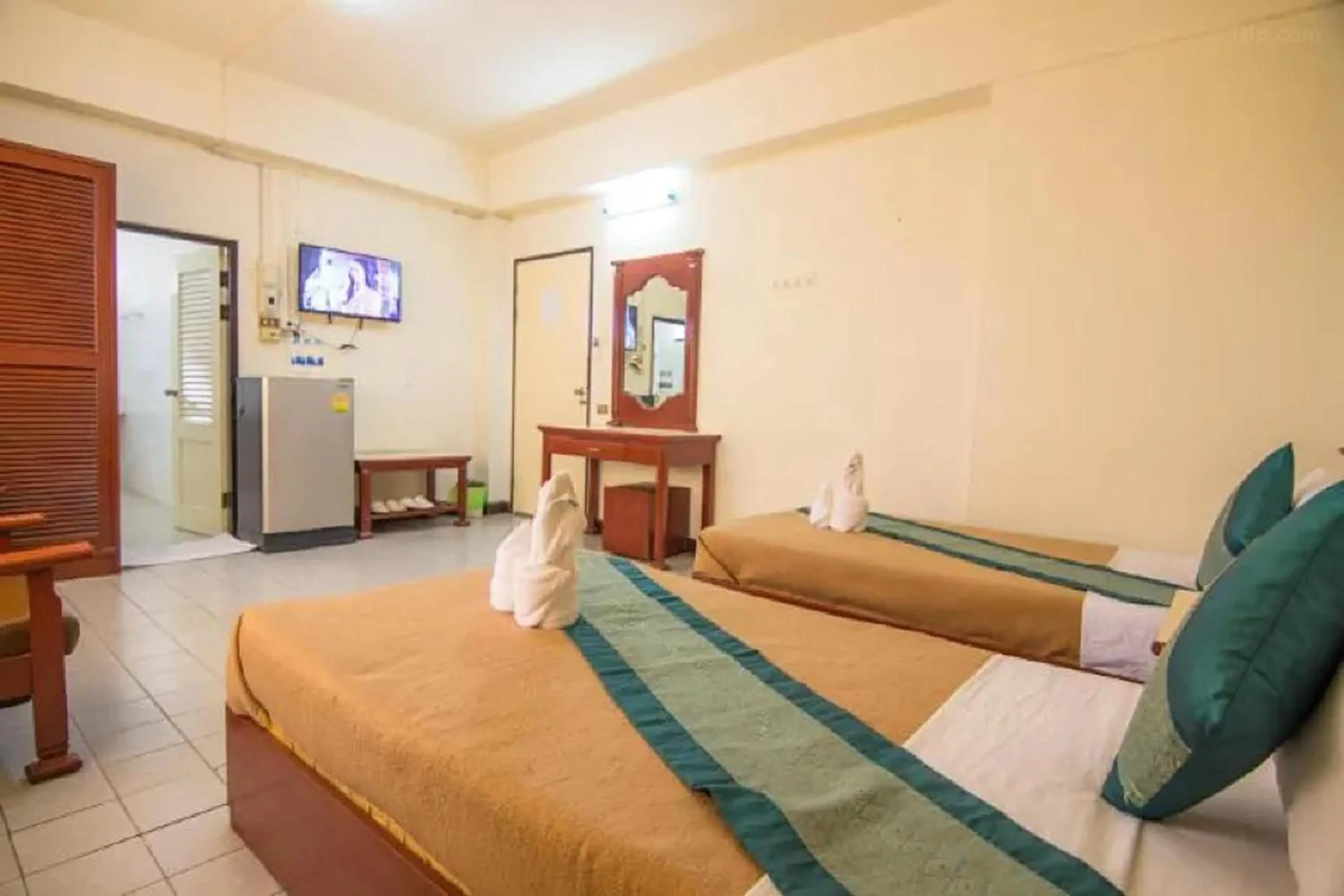 Bed in Khelang Nakorn Hotel