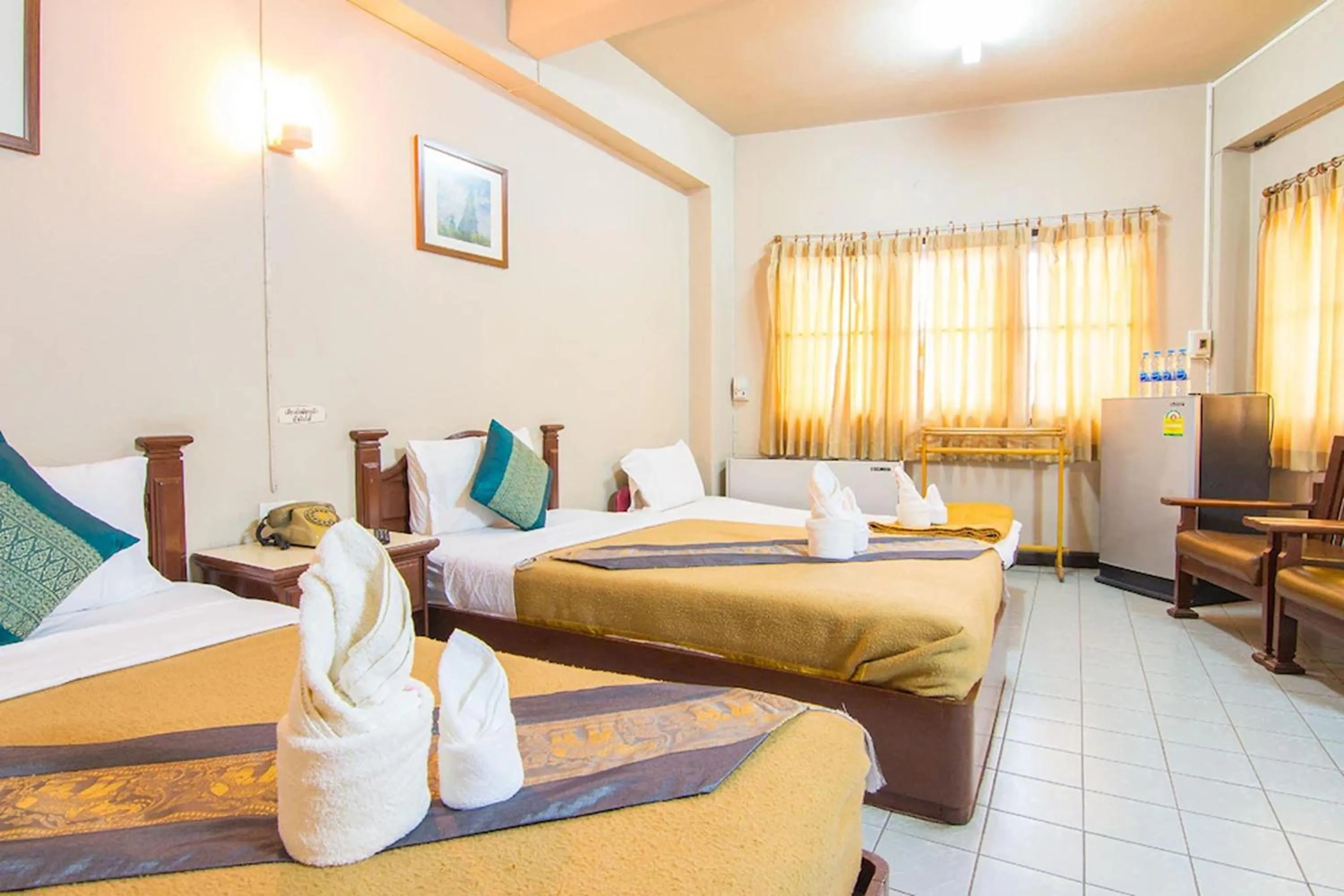 Bed in Khelang Nakorn Hotel