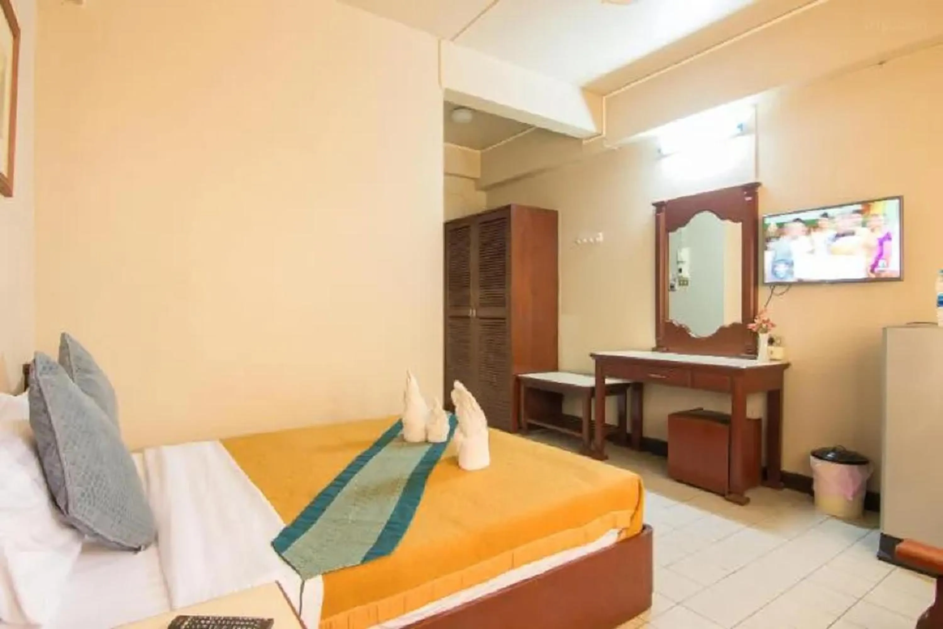 Bed in Khelang Nakorn Hotel