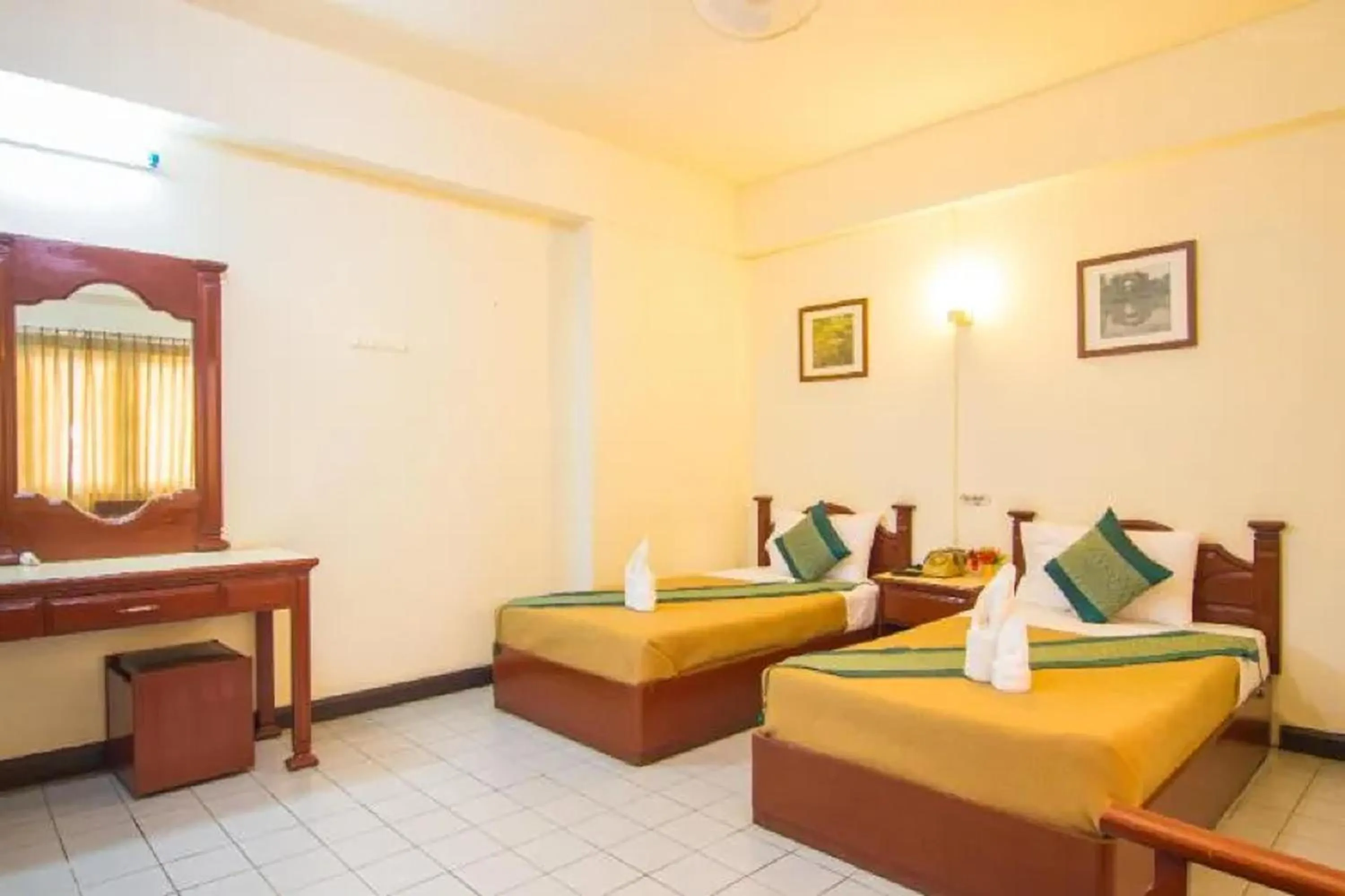 Bed in Khelang Nakorn Hotel