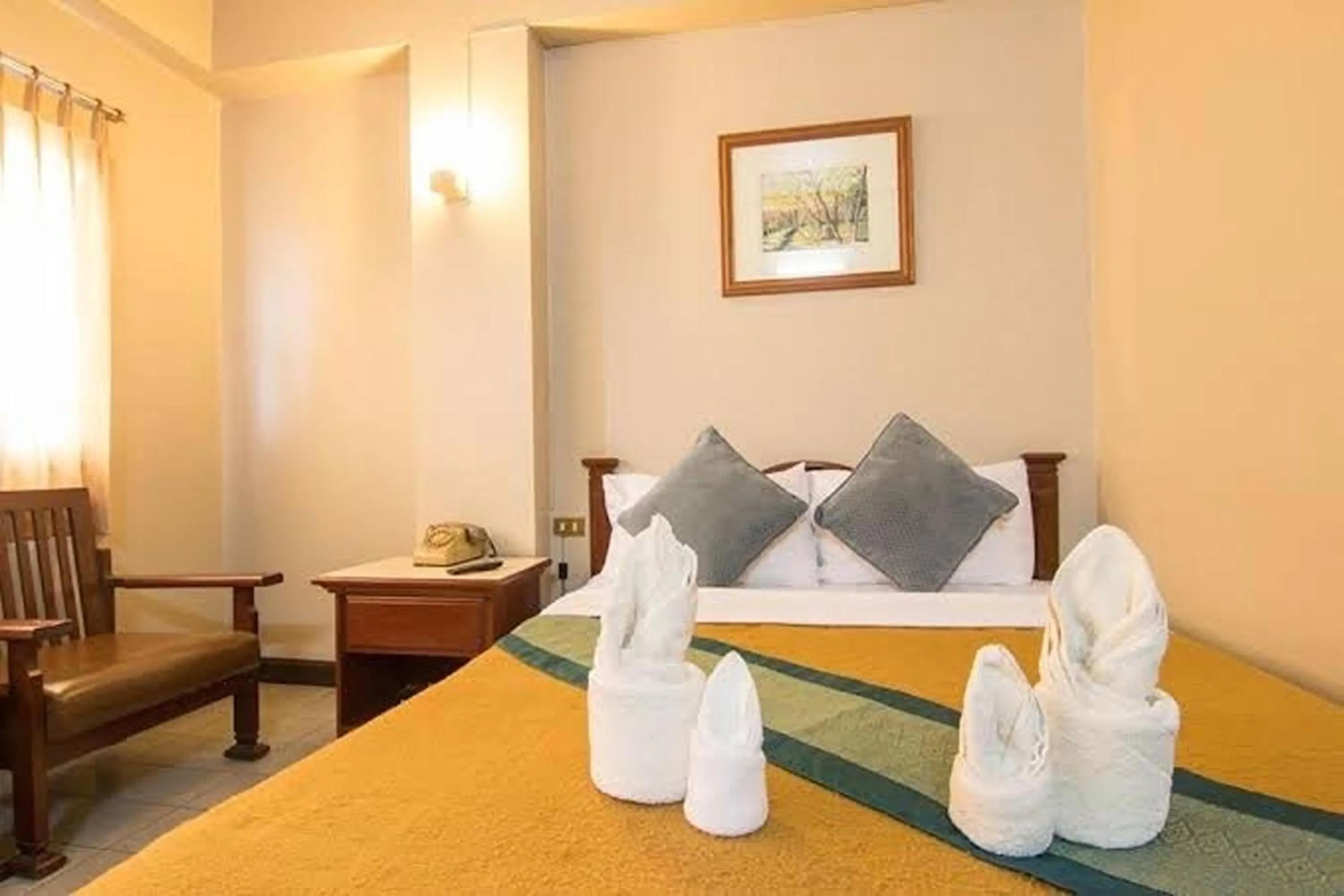 Bed in Khelang Nakorn Hotel