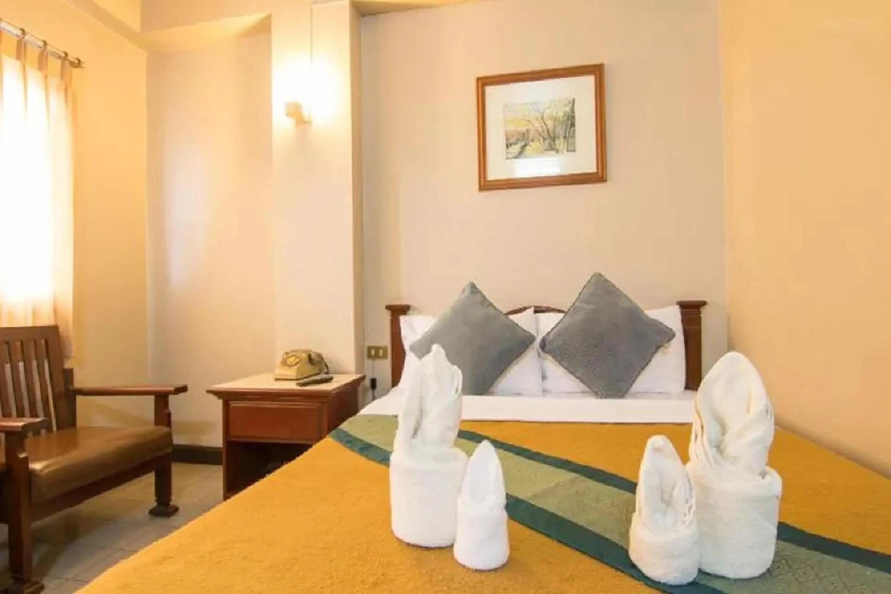 Bed in Khelang Nakorn Hotel