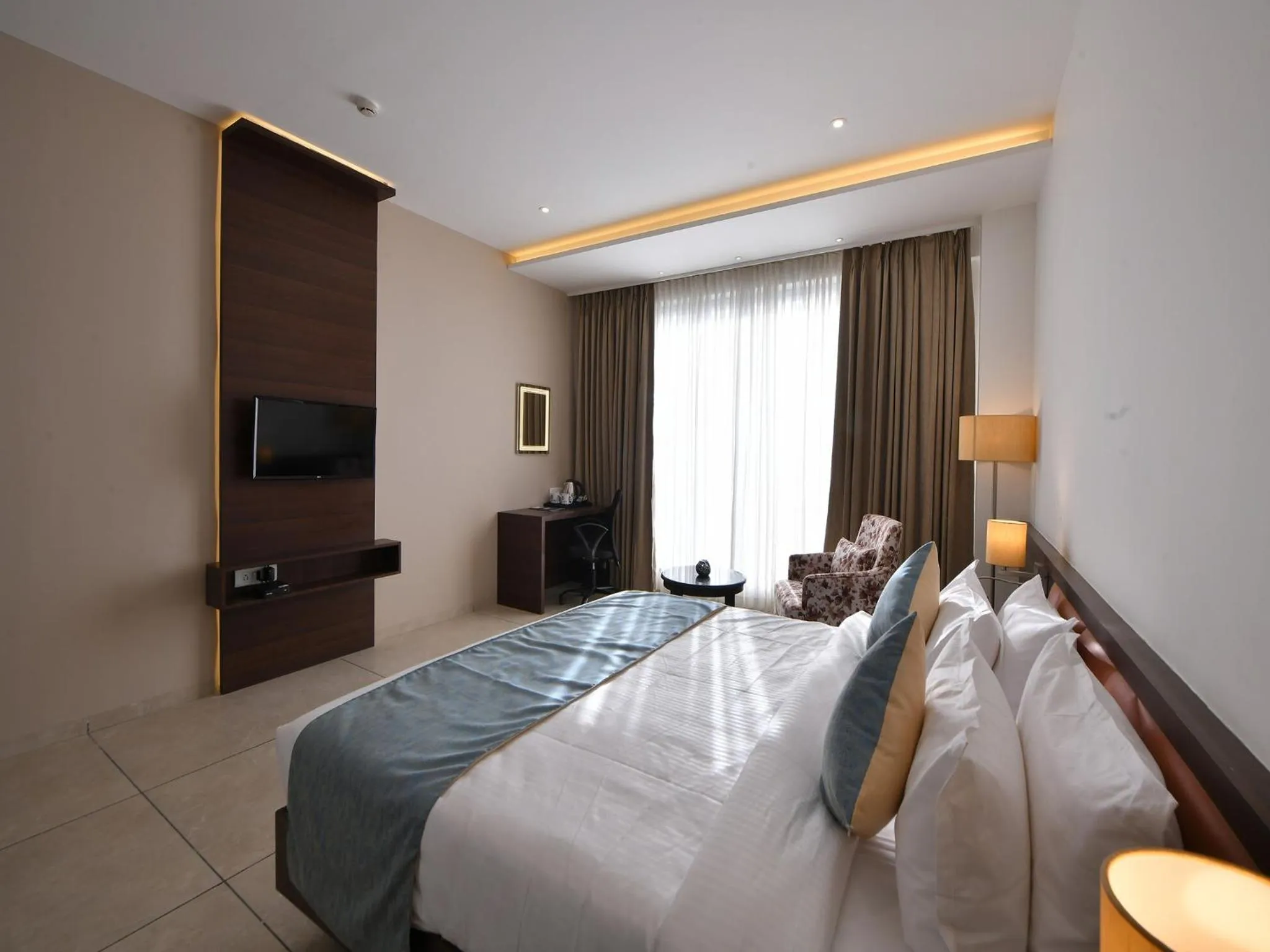 Bed in Clubhouse Hotel by CheckIn Morbi