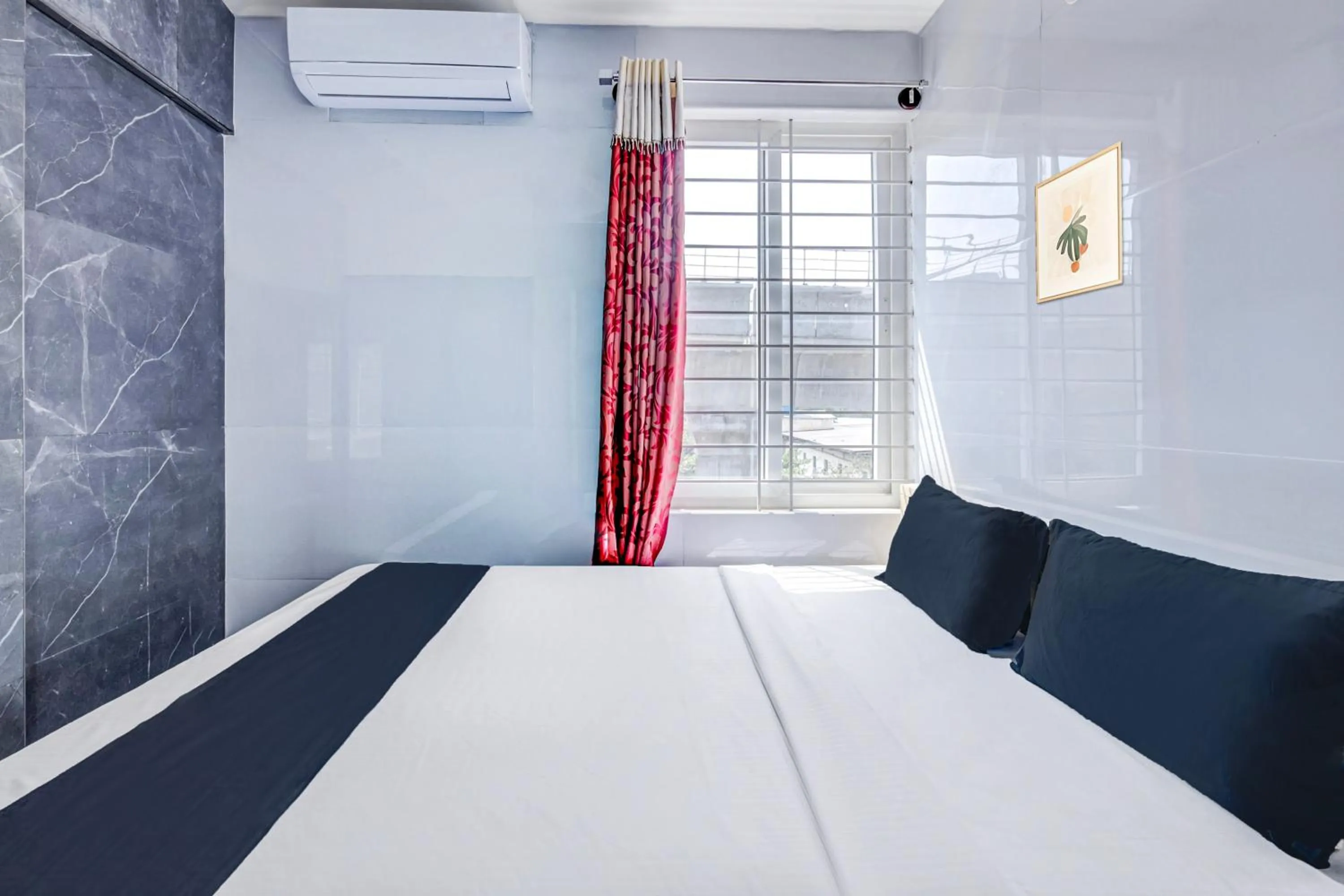 Bedroom in Collection O Sapthagiri Inn