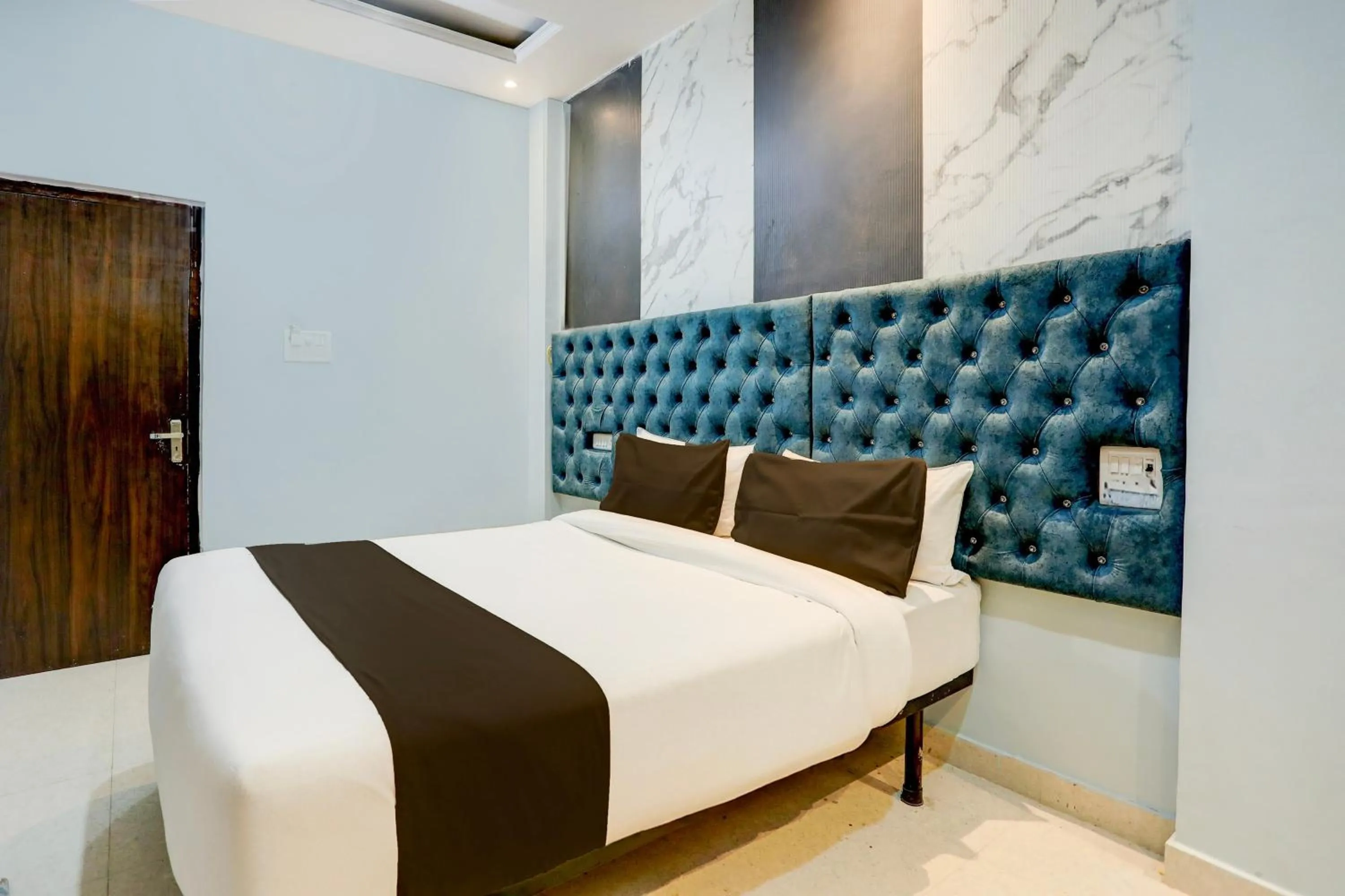 Bedroom in Super Hotel O SHIVA VALLEY HOTEL