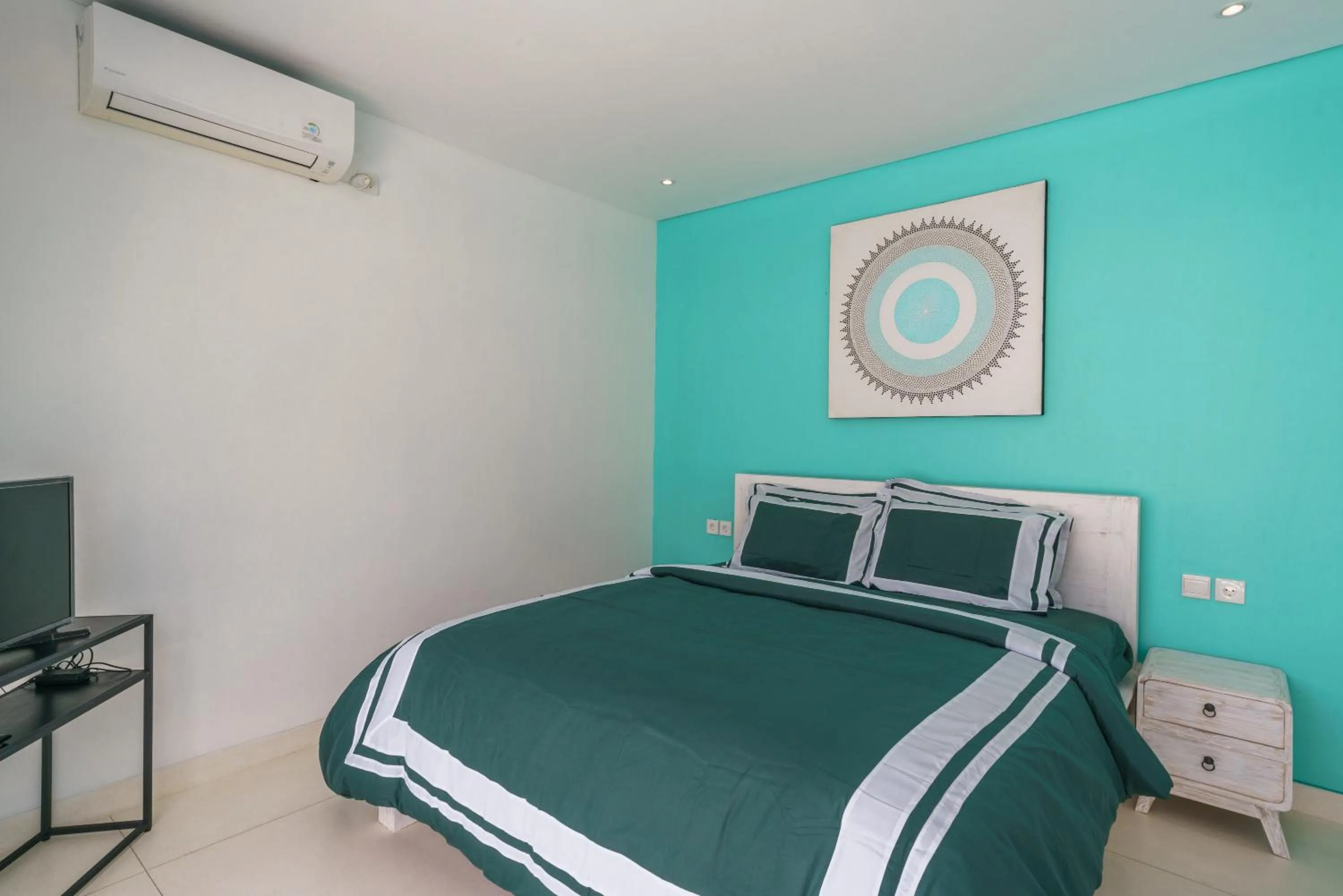 Bed in Abian Kapas Beach House