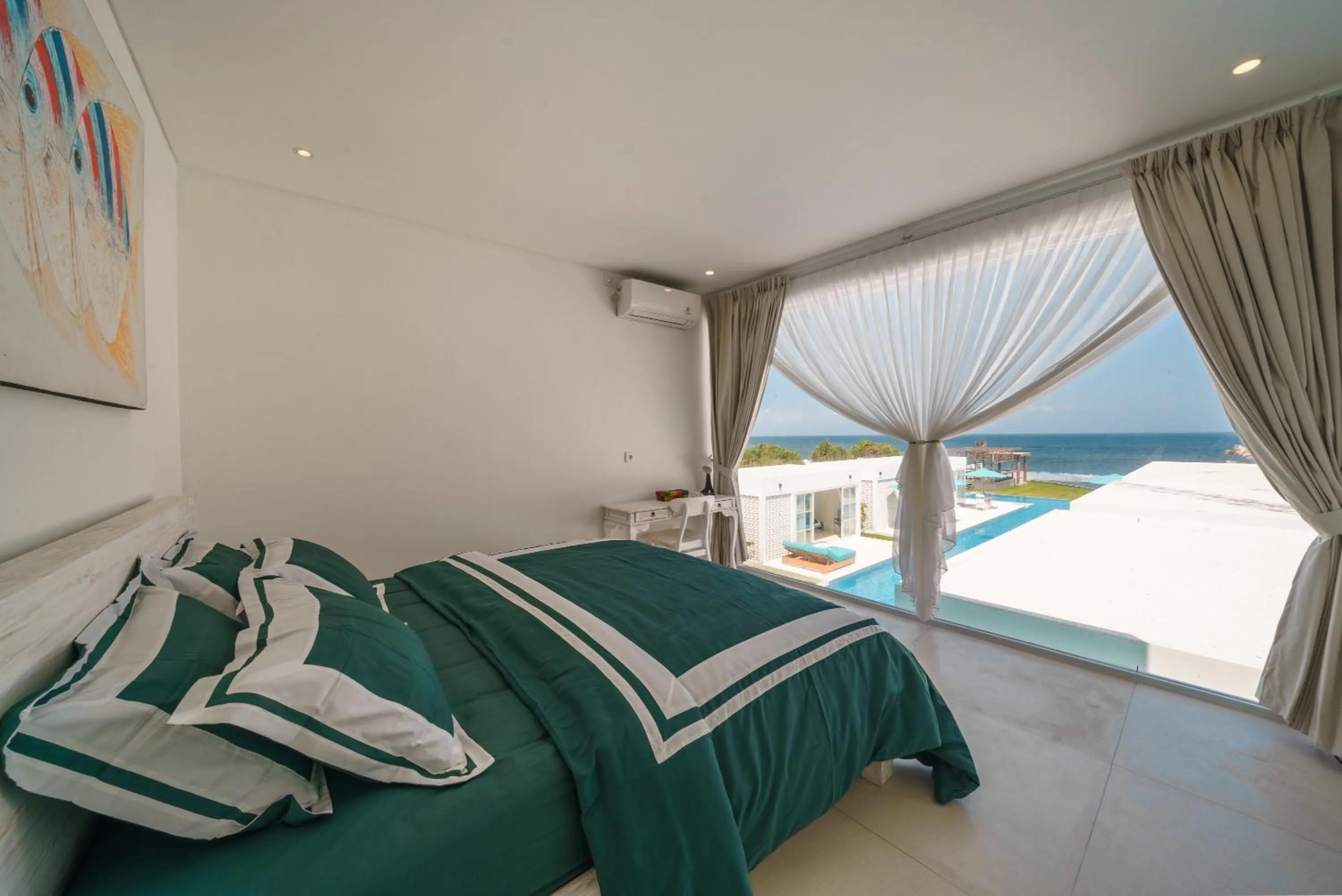 Bed in Abian Kapas Beach House