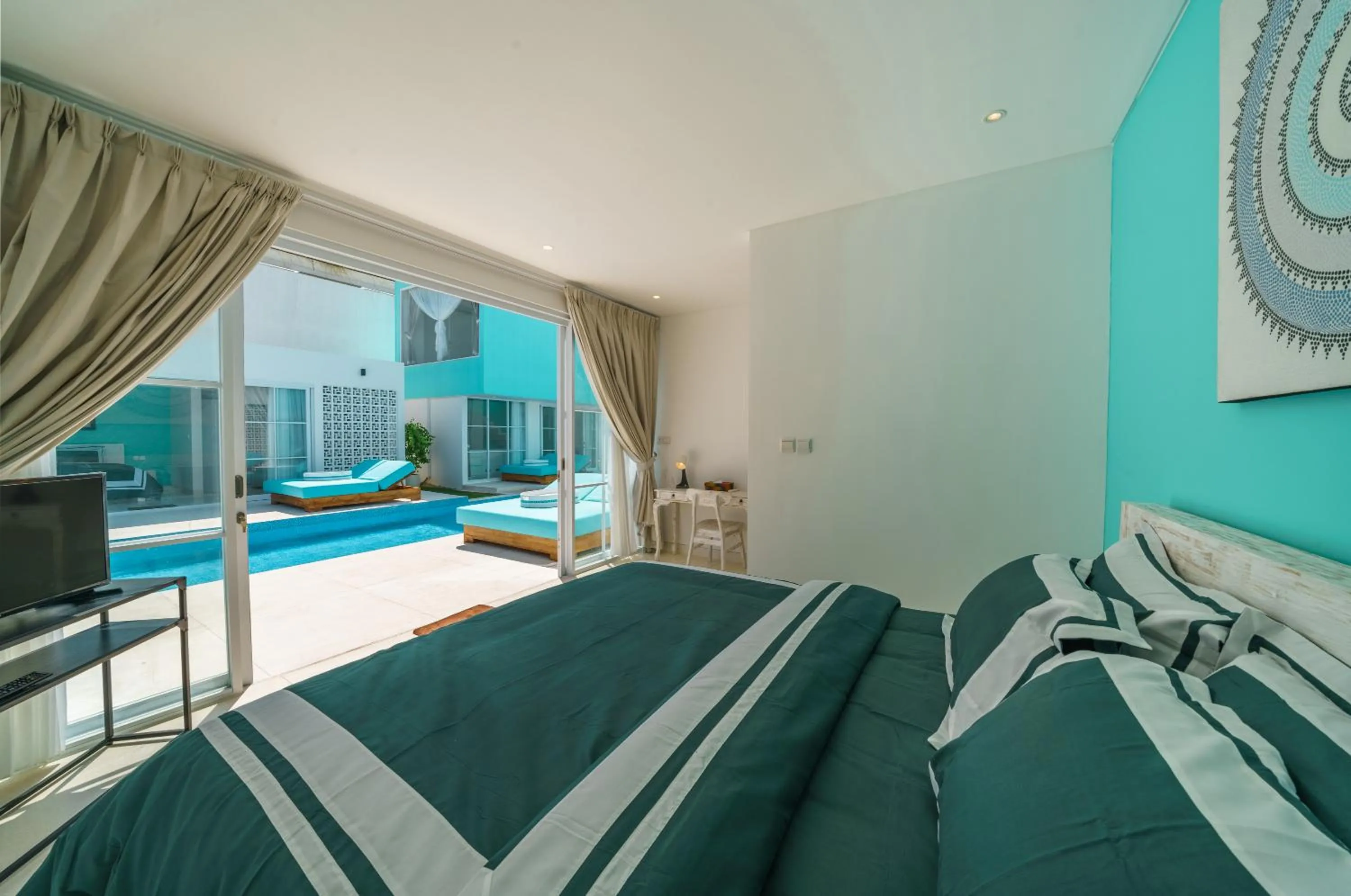 Bed in Abian Kapas Beach House