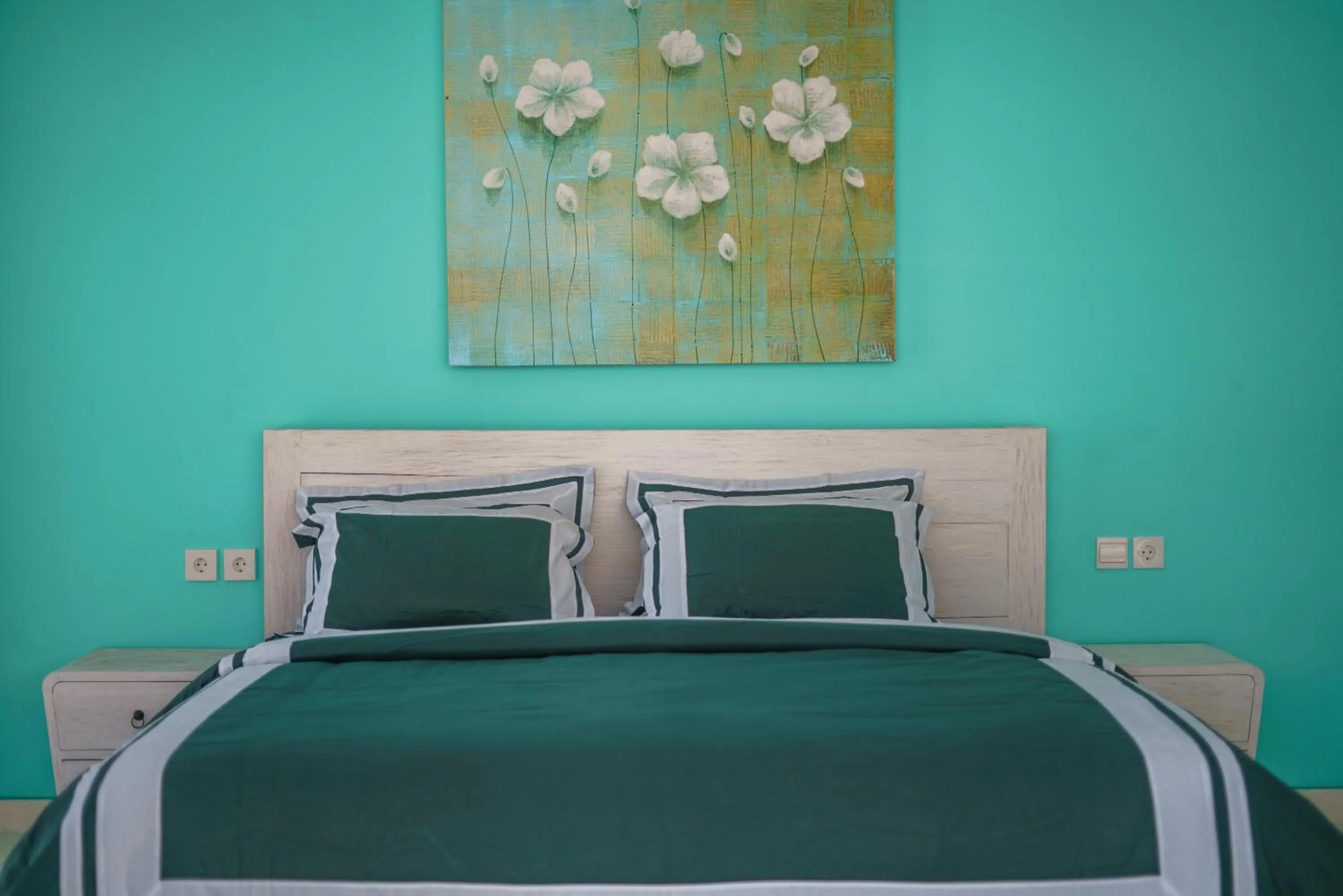 Bed in Abian Kapas Beach House