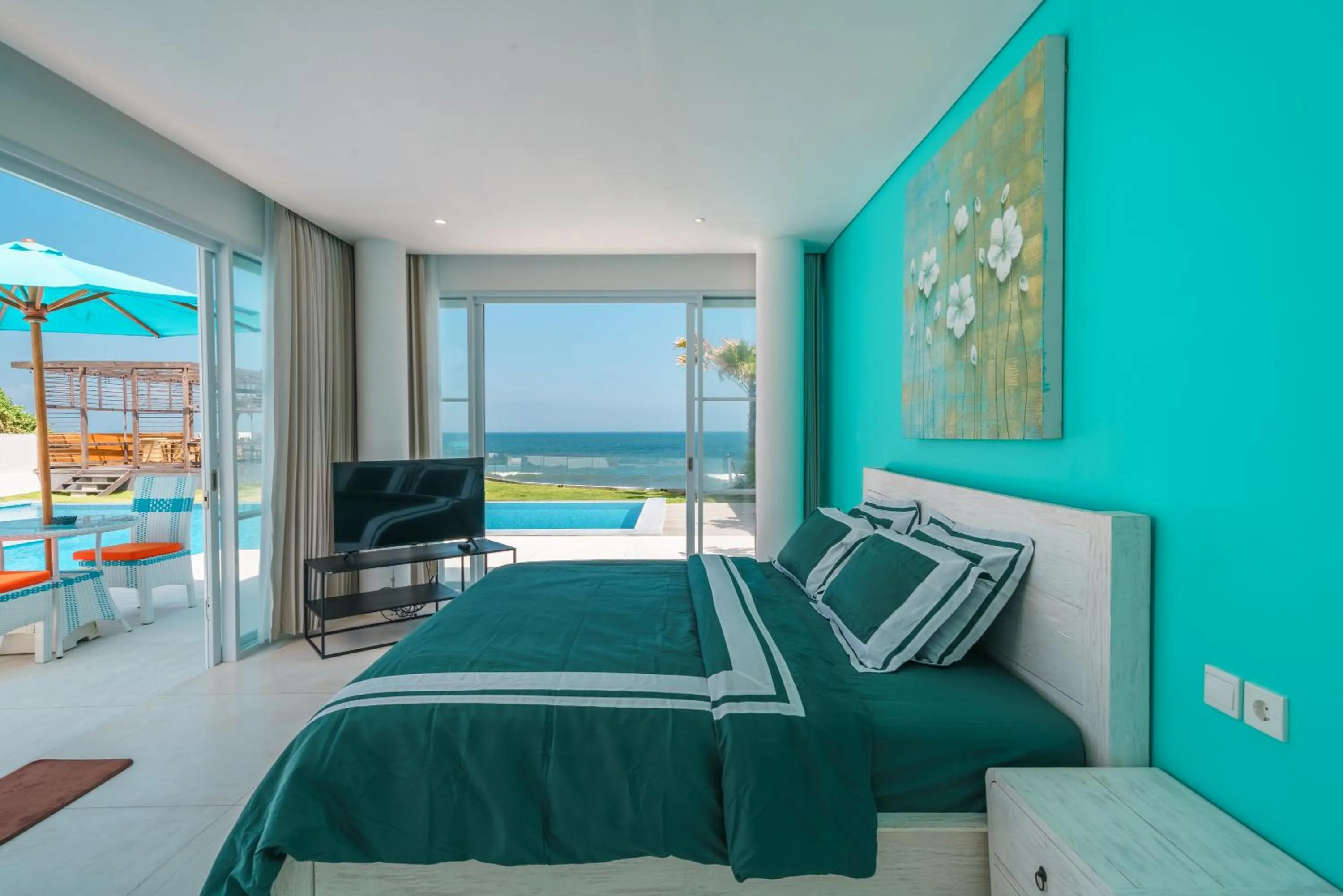 Bed in Abian Kapas Beach House