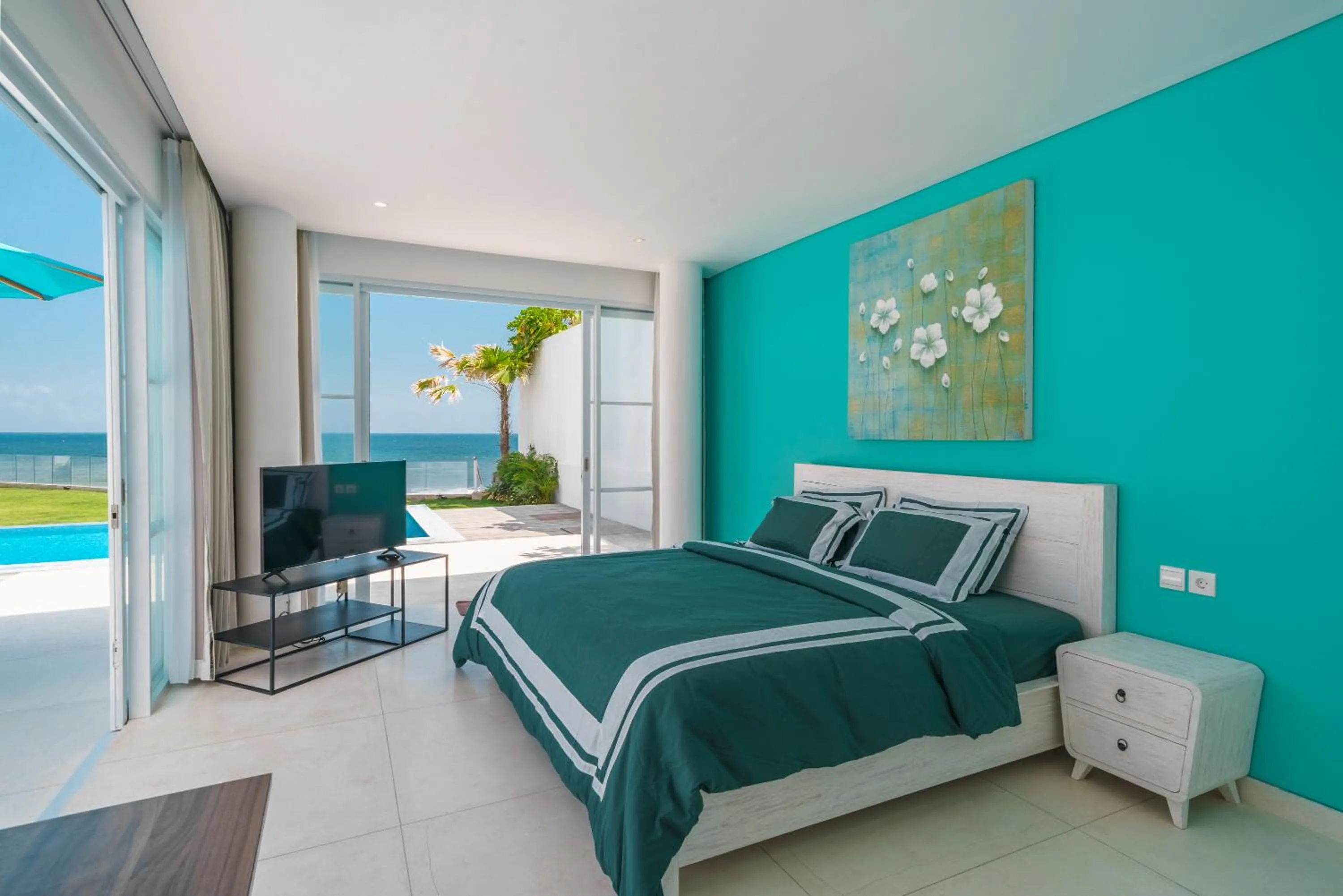 Bed in Abian Kapas Beach House