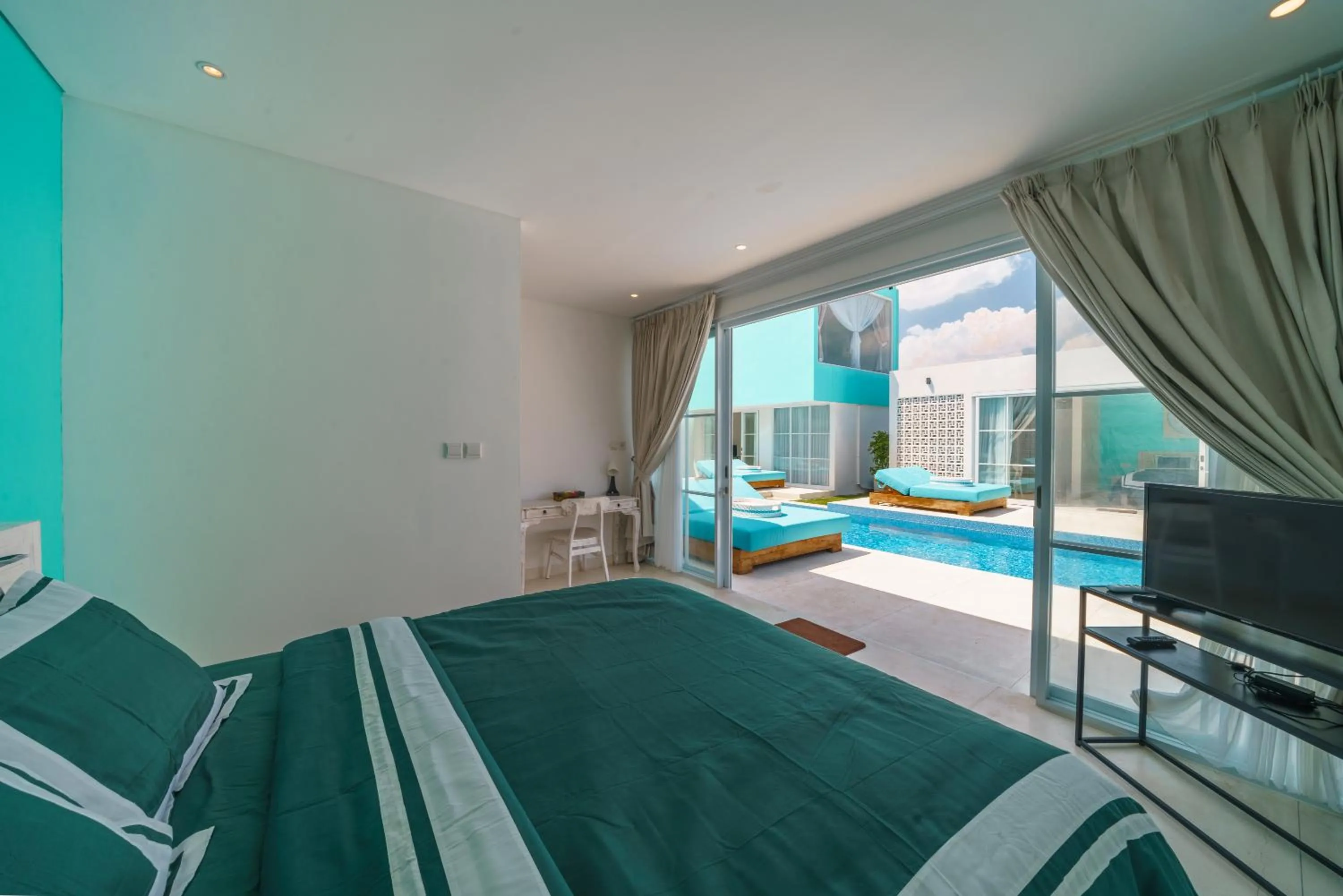 Bed in Abian Kapas Beach House