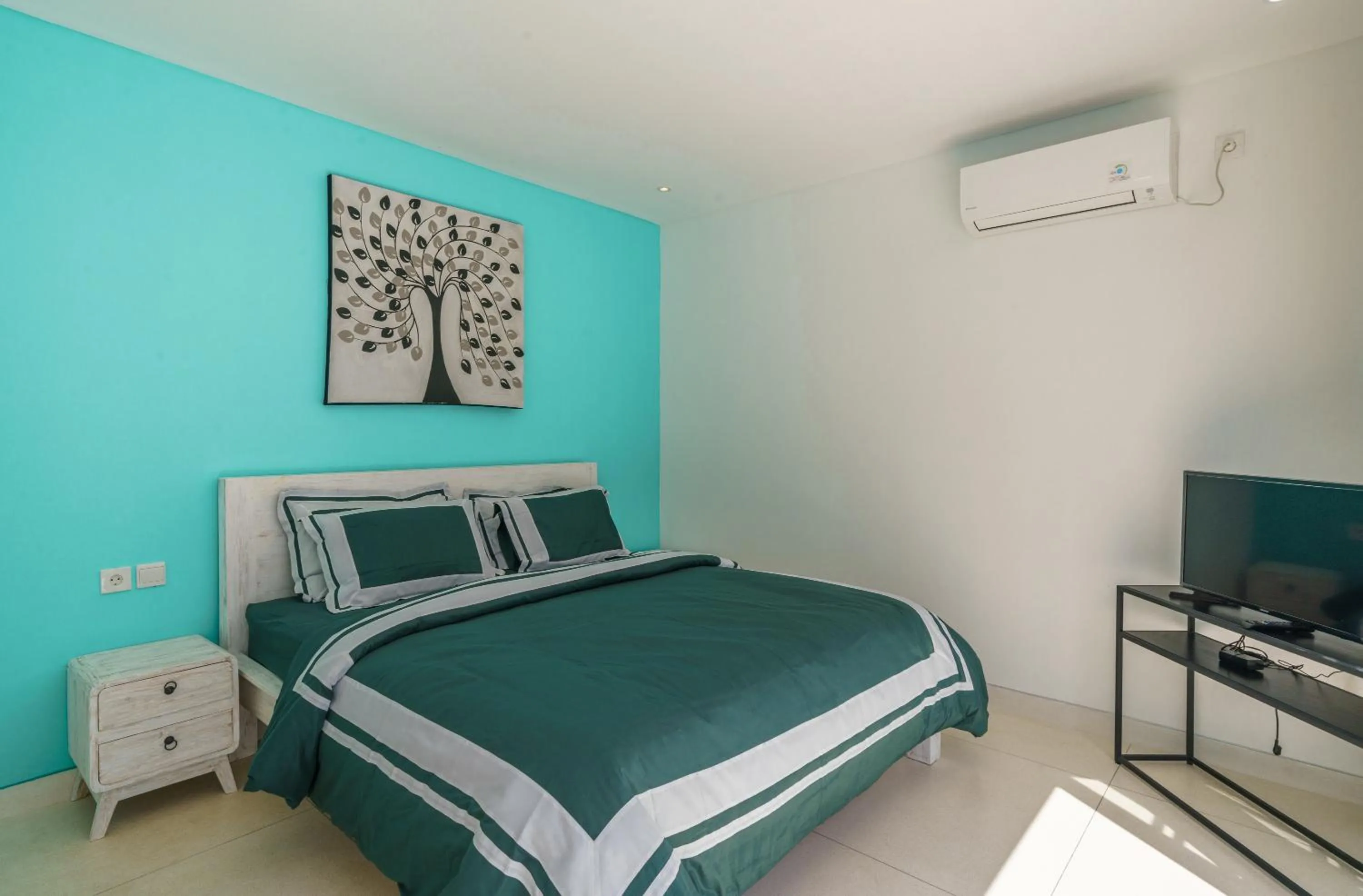 Bed in Abian Kapas Beach House