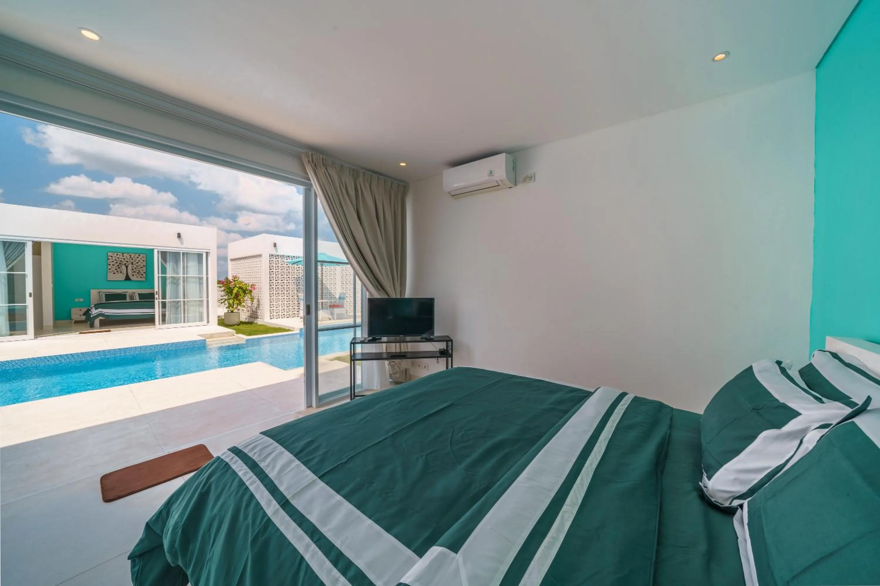 Bed in Abian Kapas Beach House