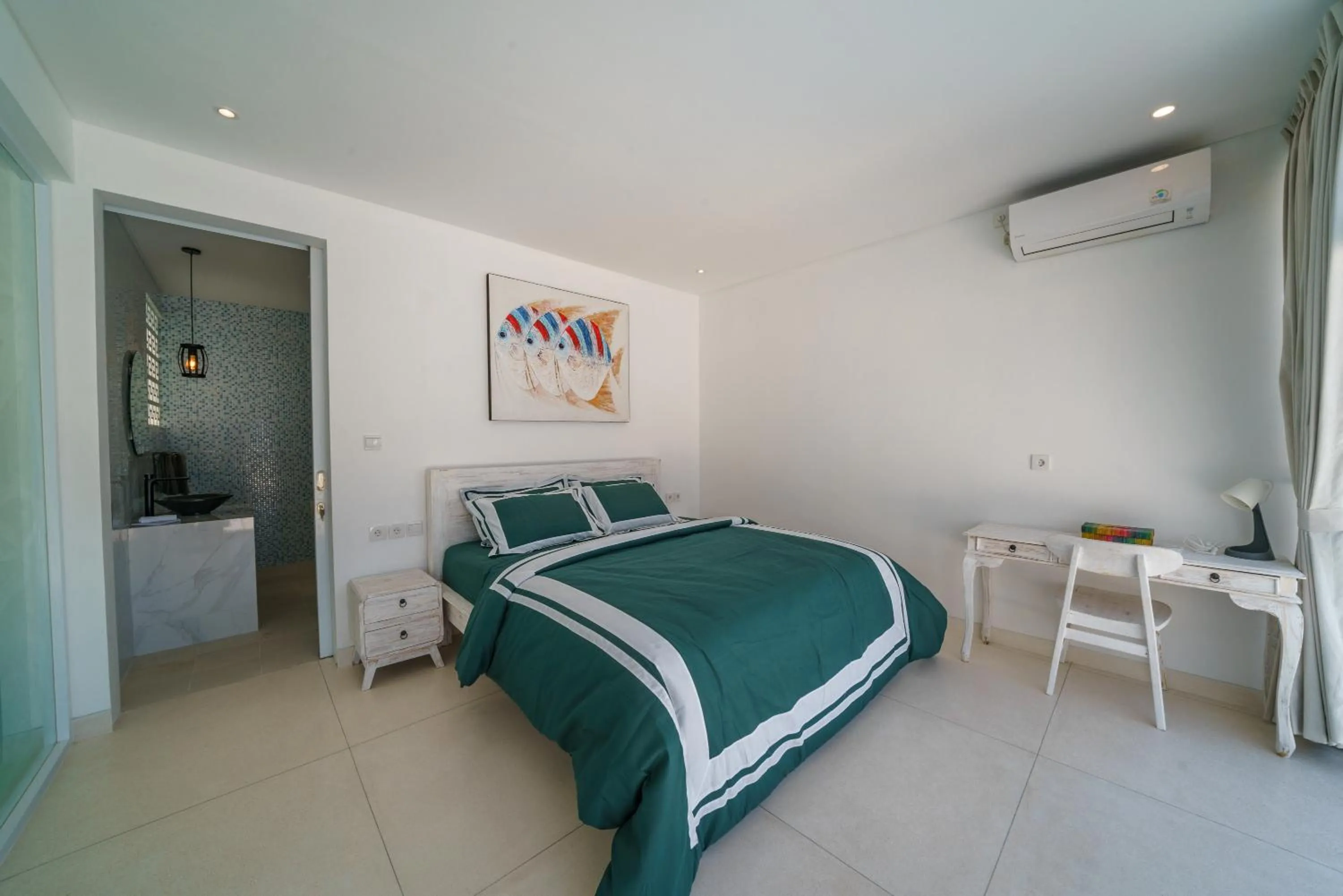Bed in Abian Kapas Beach House