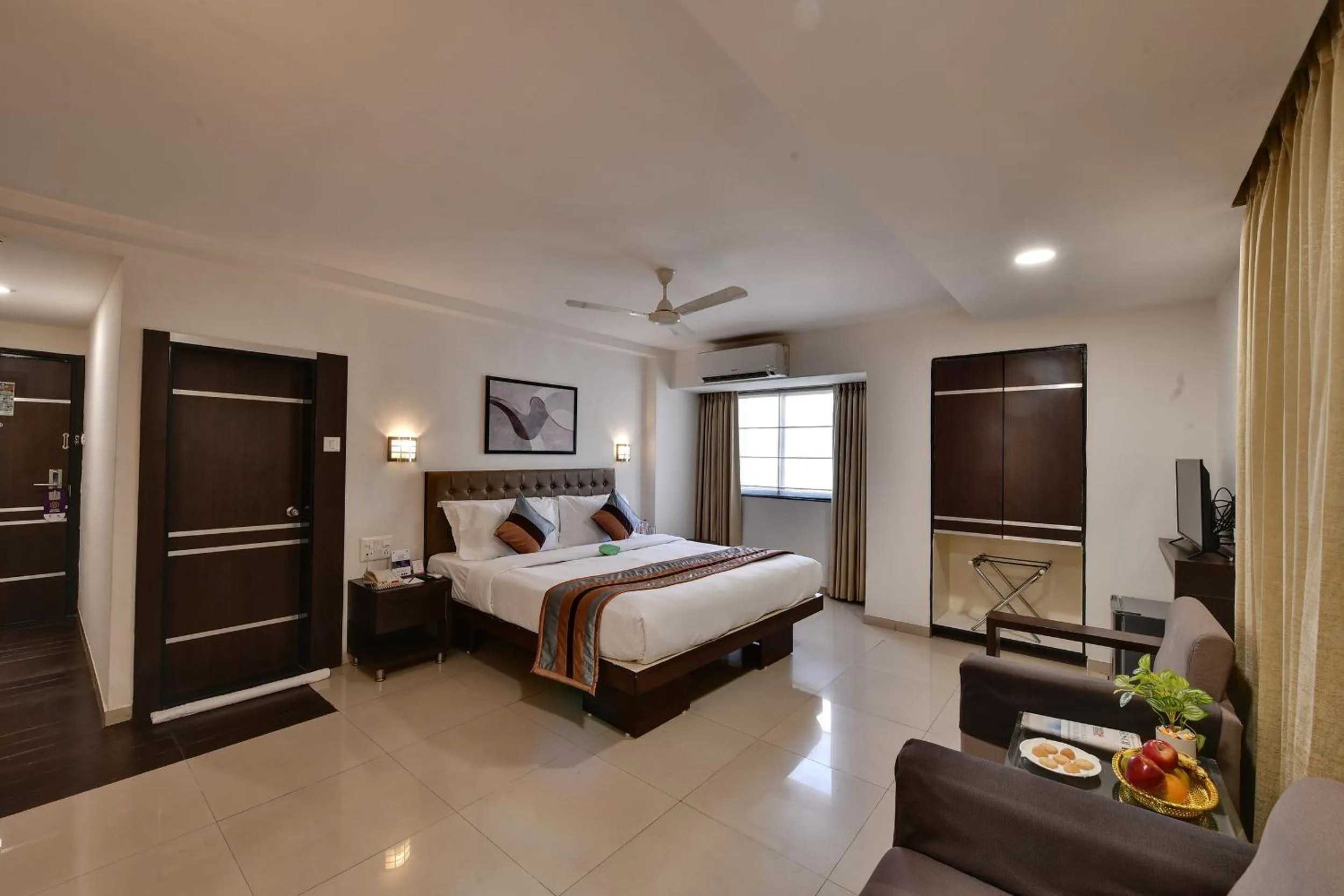 Bed in Click Hotel Yuvraj