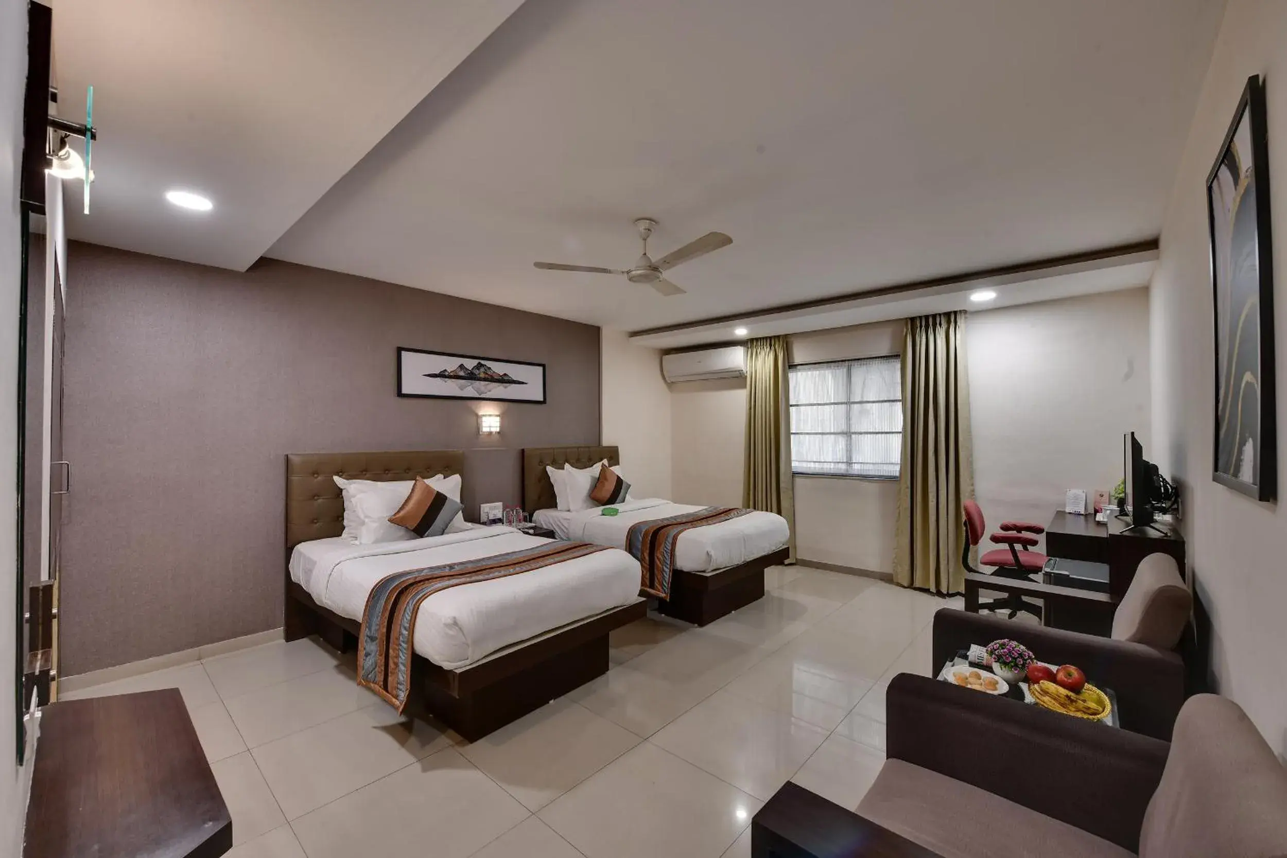 Bed in Click Hotel Yuvraj Bed in Click Hotel Yuvraj