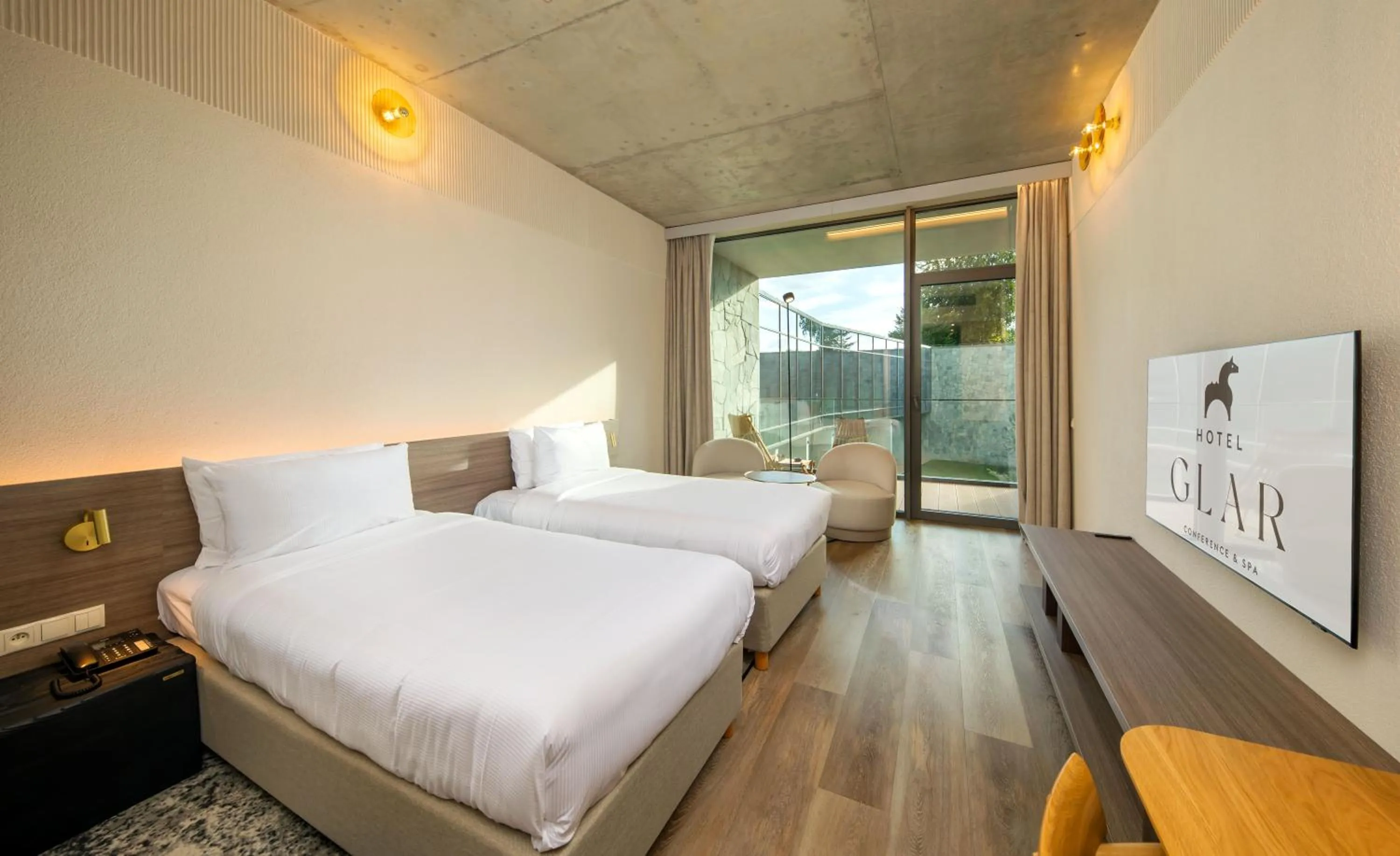 Bed in Hotel GLAR Conference & SPA