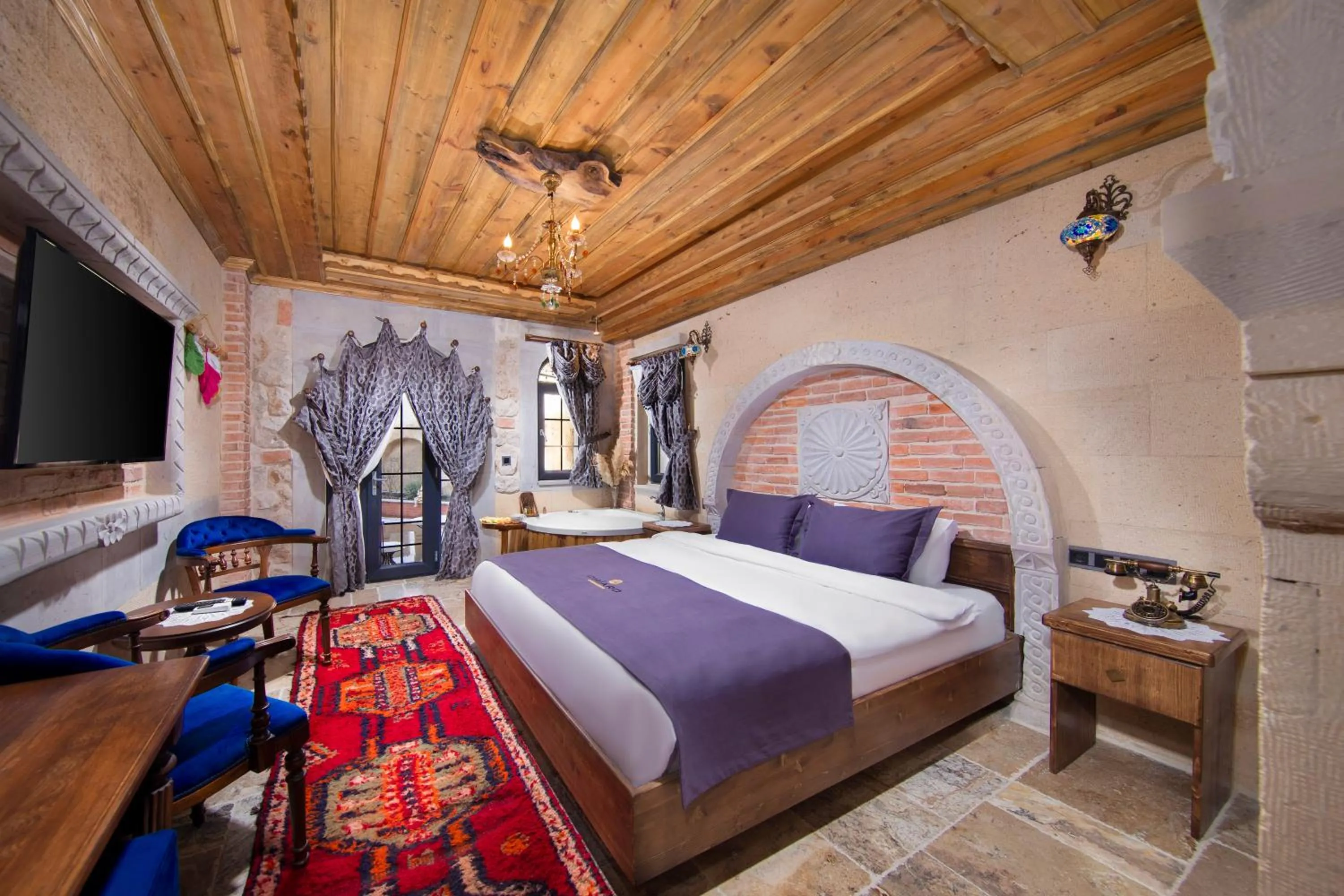 Communal lounge/ TV room, Bed in Cappadocia Chiaro