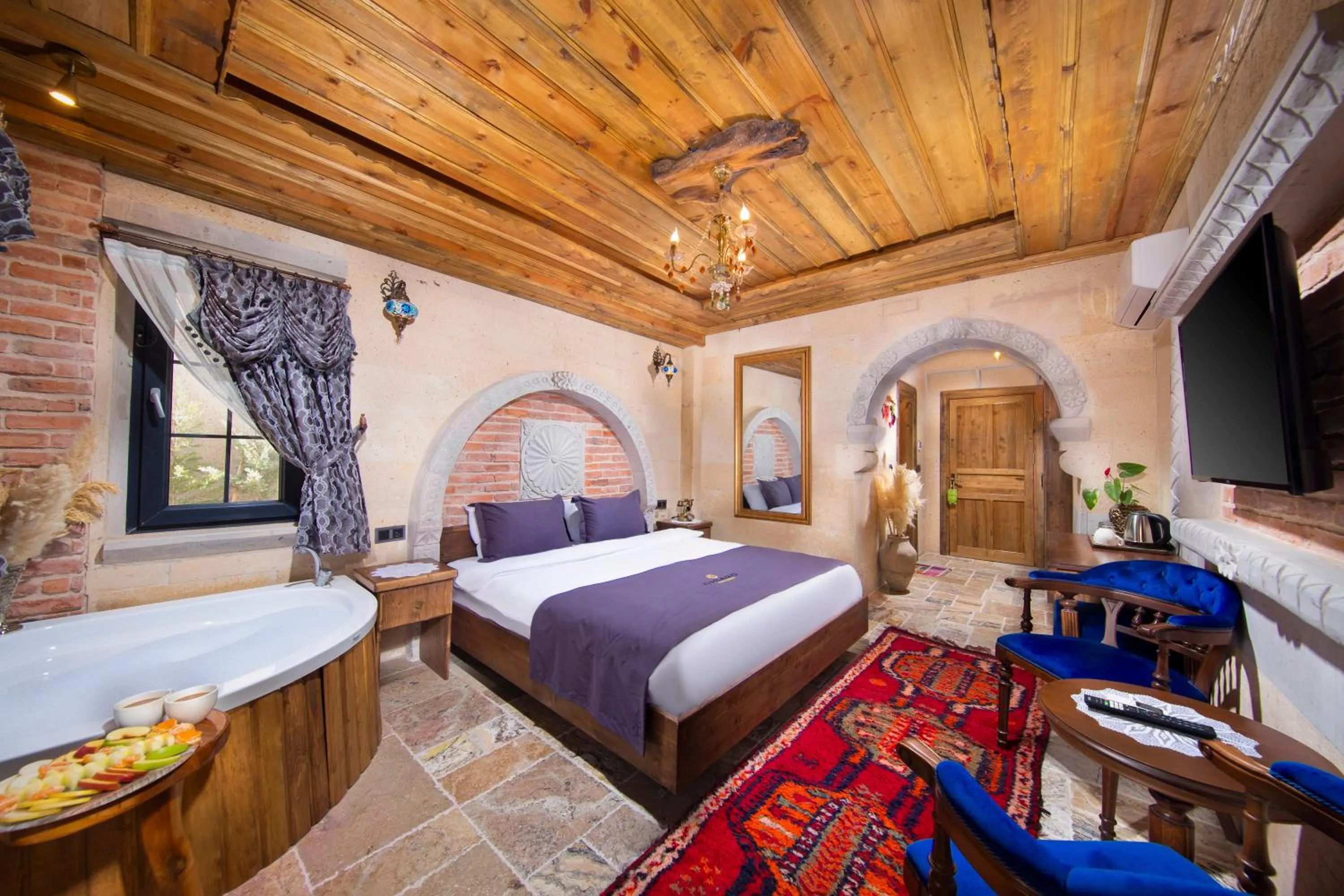 Communal lounge/ TV room, Bed in Cappadocia Chiaro