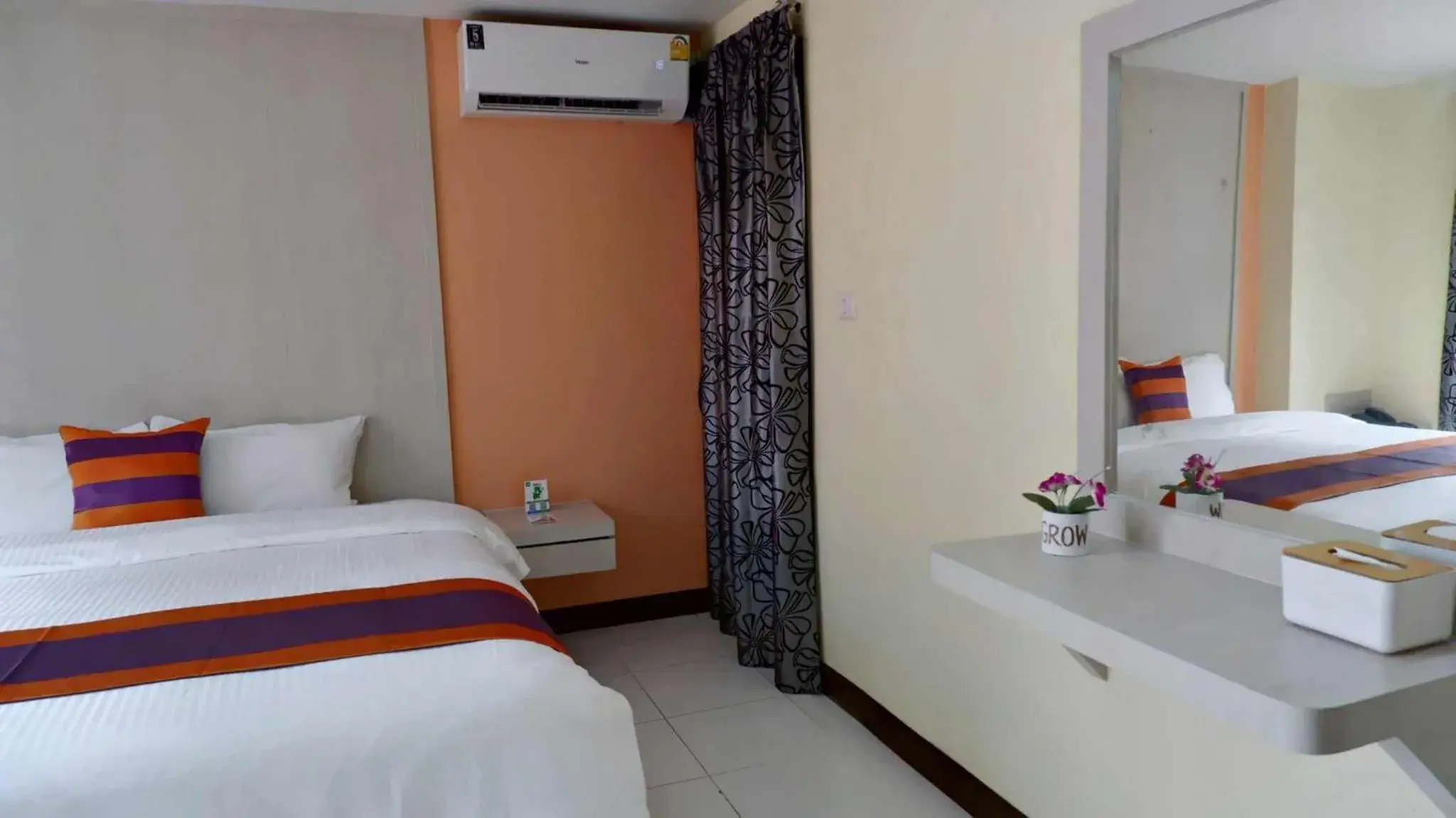 Bed in Aryan Suites Hotel Bed in Aryan Suites Hotel