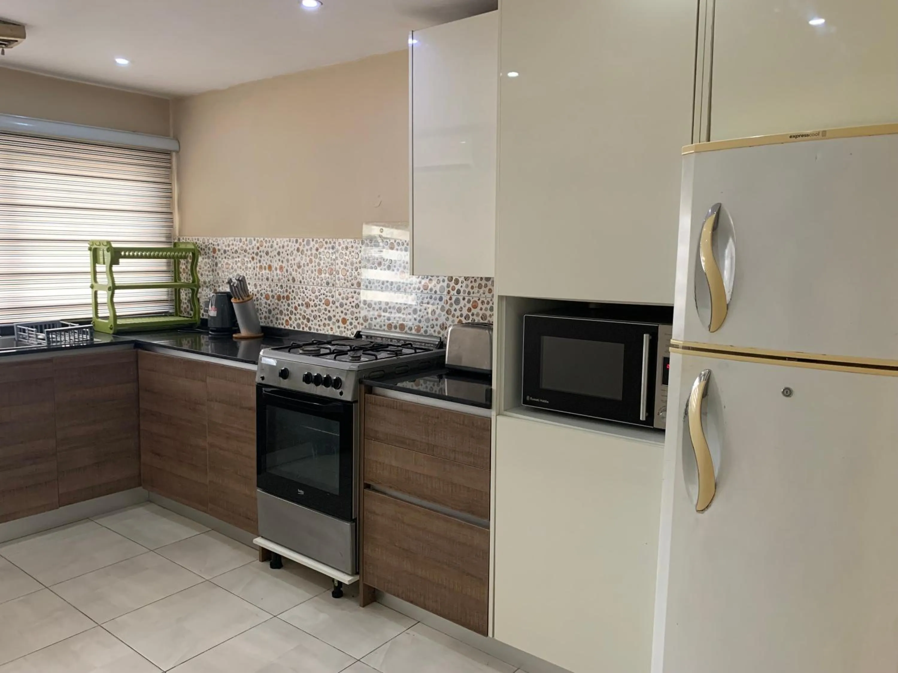 Kitchen or kitchenette in Emem Court - The Emem Apartment Collections
