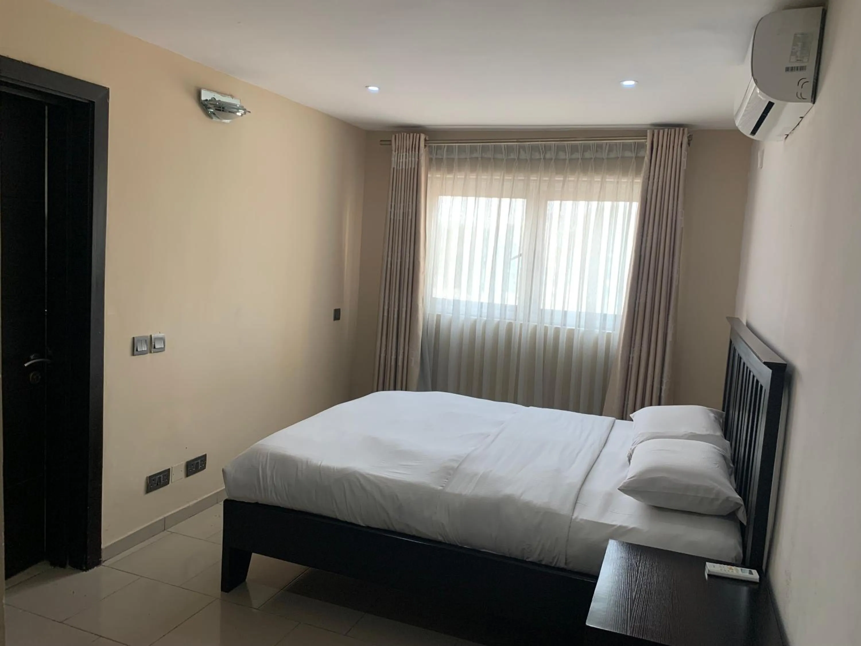 Bed in Emem Court - The Emem Apartment Collections