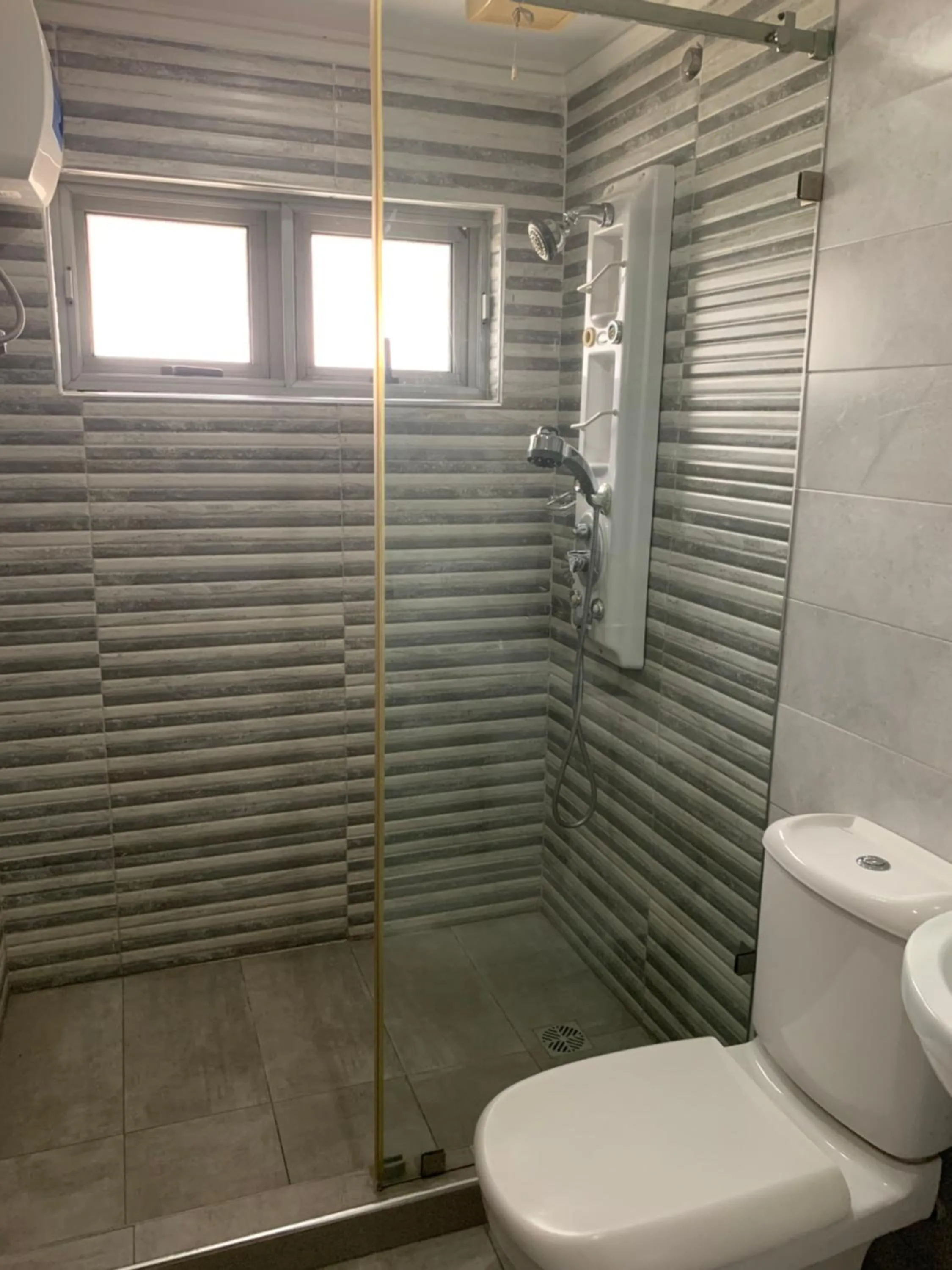 Shower in Emem Court - The Emem Apartment Collections