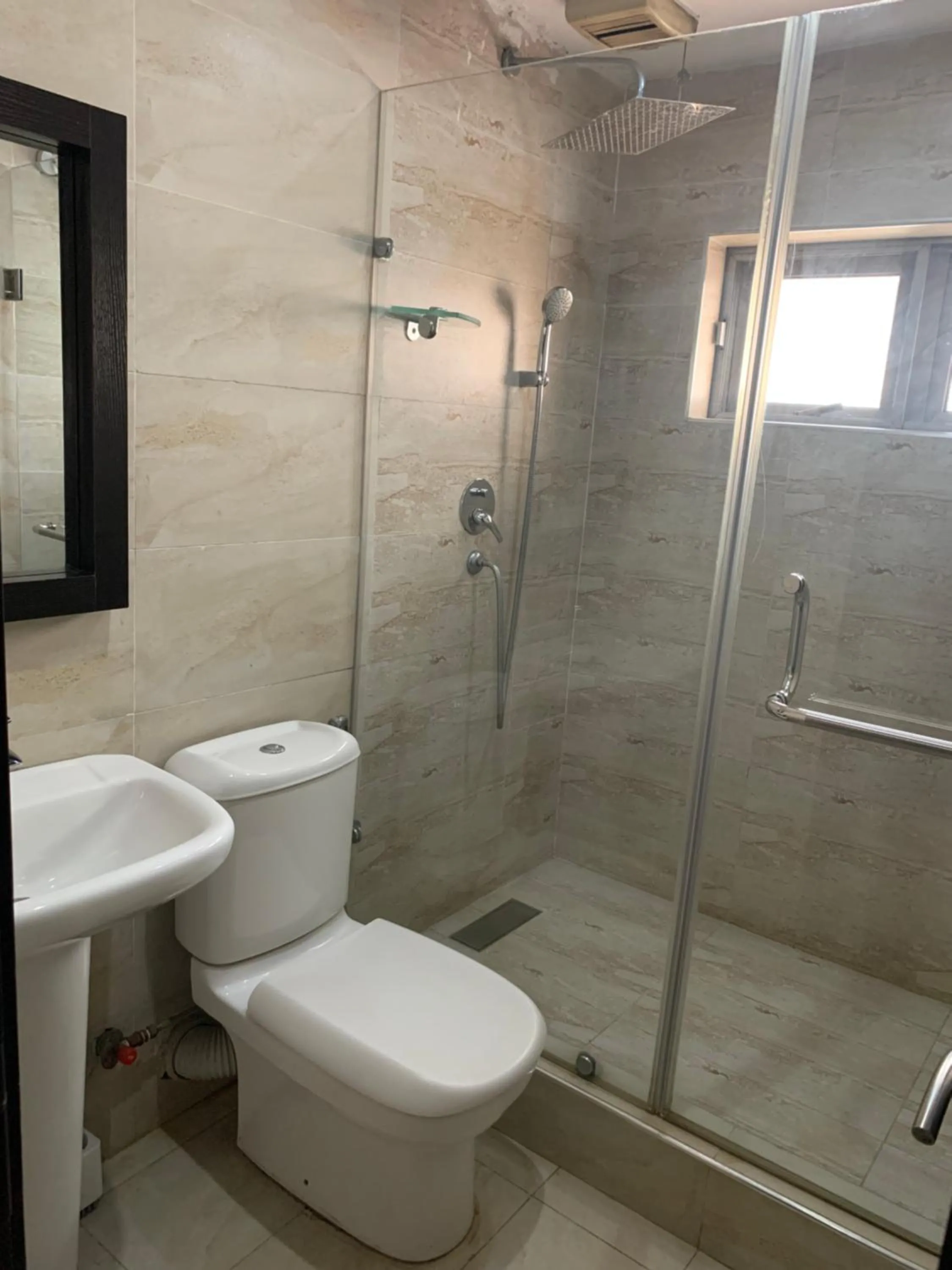 Shower in Emem Court - The Emem Apartment Collections