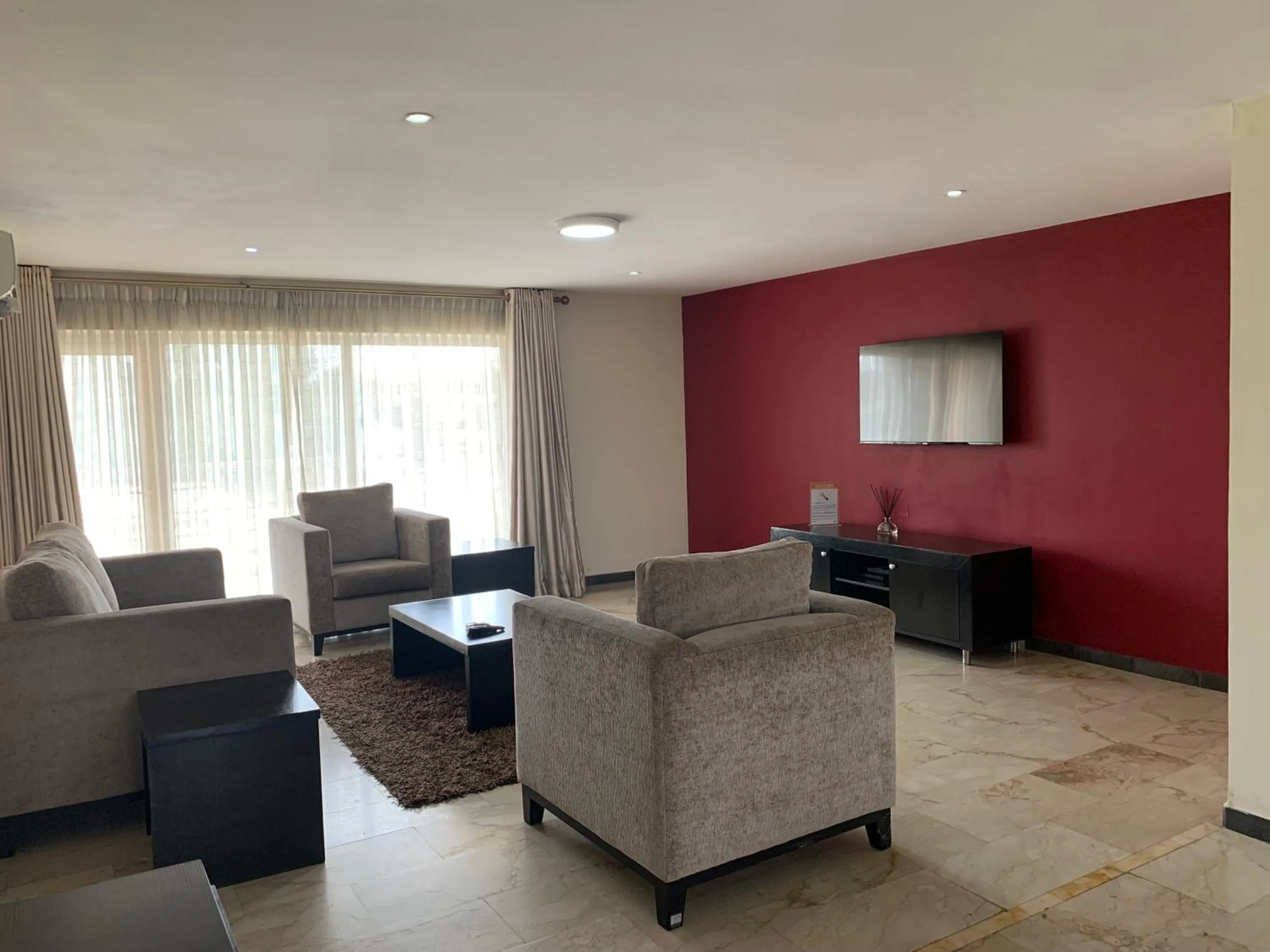 TV and multimedia in Emem Court - The Emem Apartment Collections