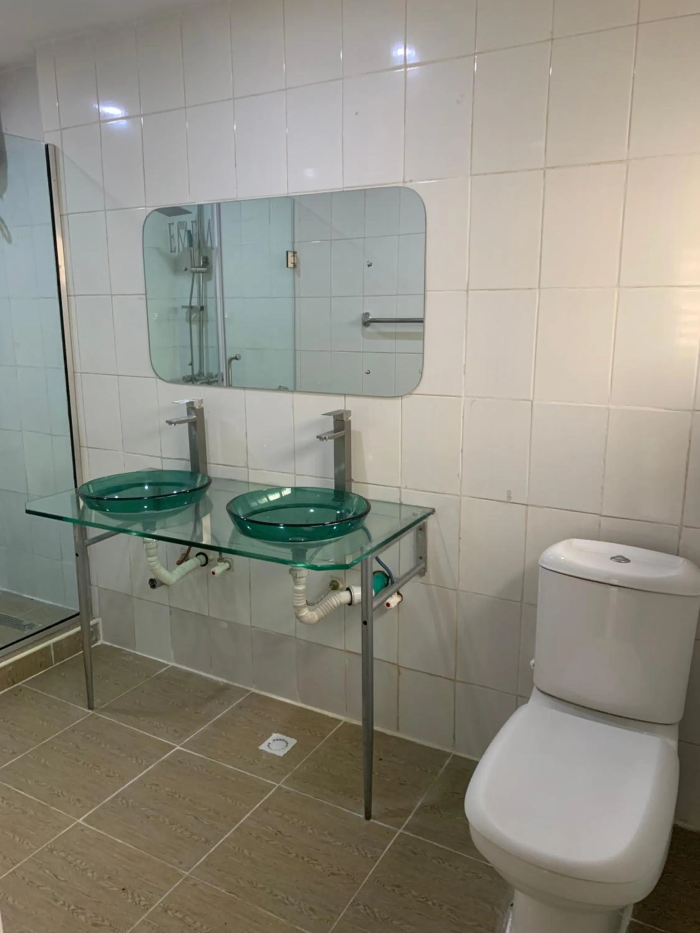 Shower in Emem Court - The Emem Apartment Collections