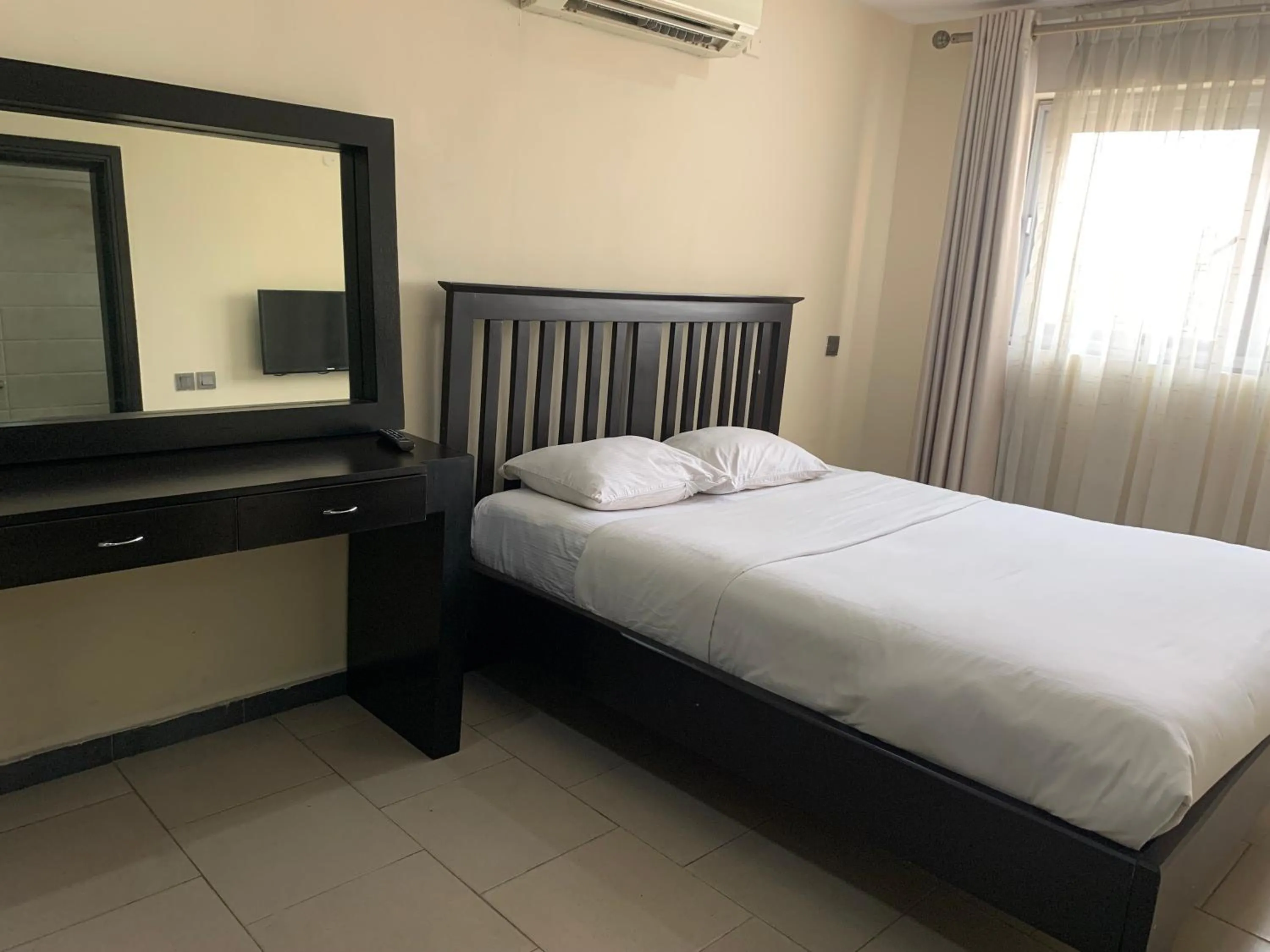 Bed in Emem Court - The Emem Apartment Collections