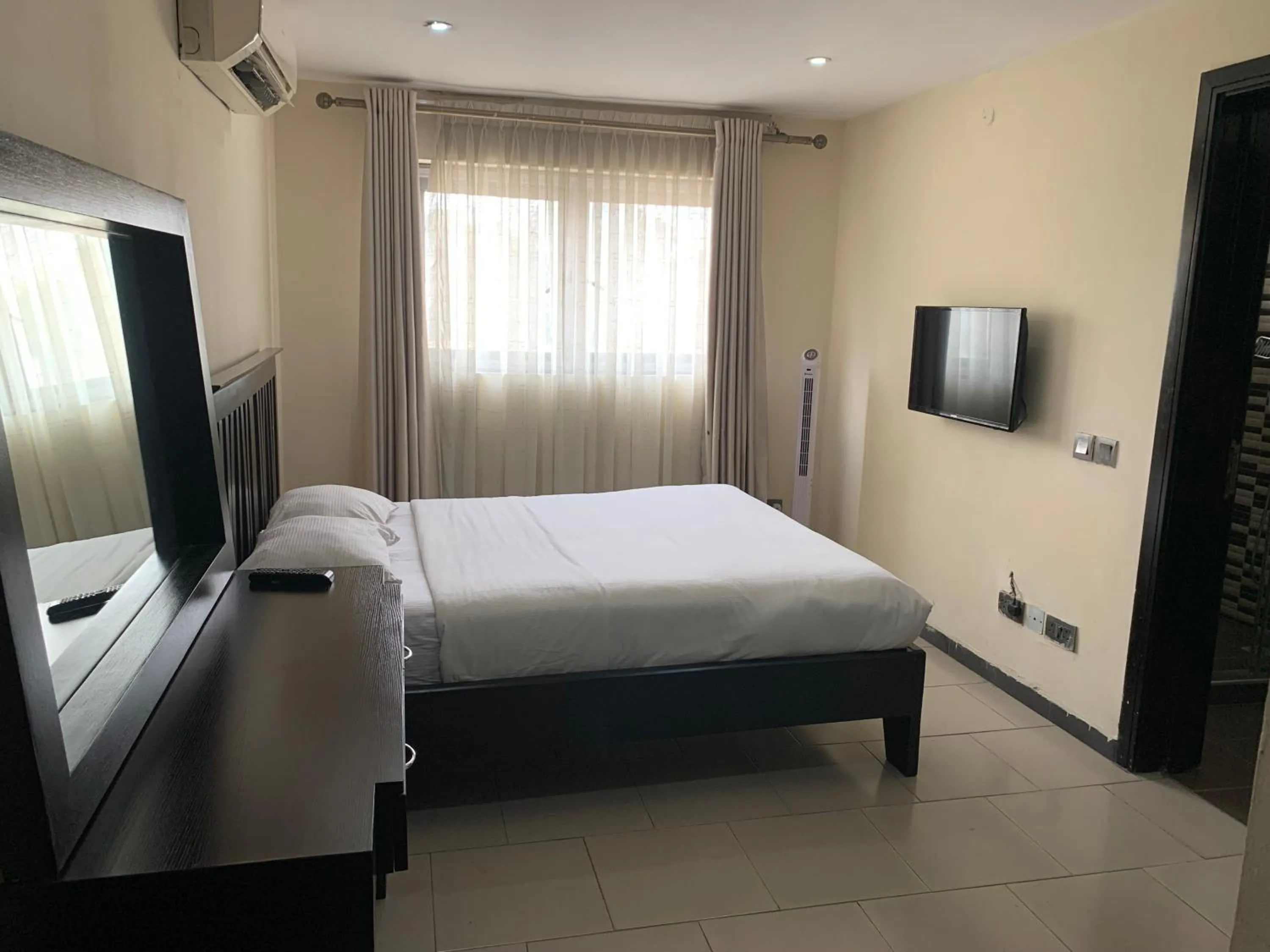 Bed in Emem Court - The Emem Apartment Collections