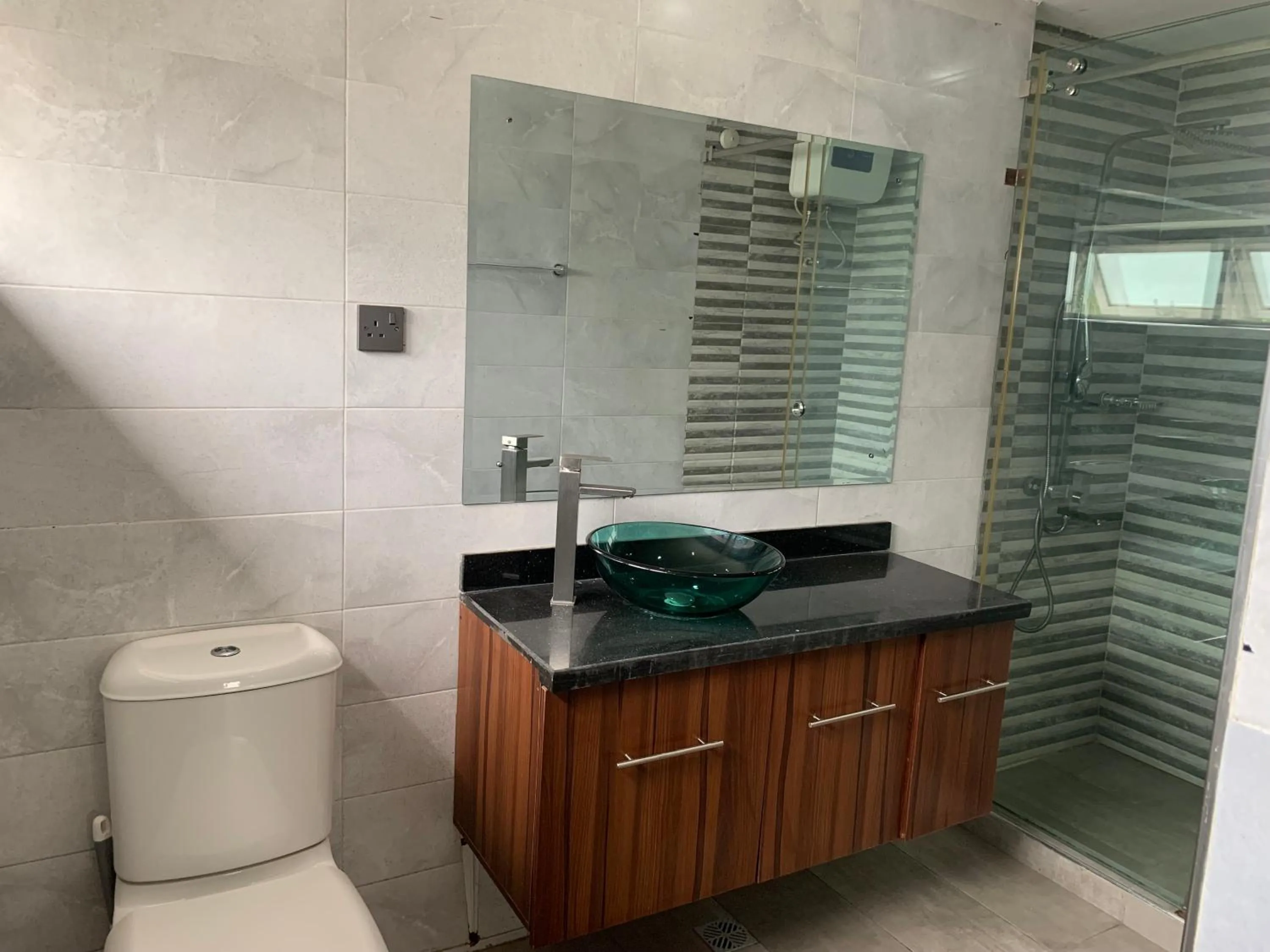 Shower in Emem Court - The Emem Apartment Collections
