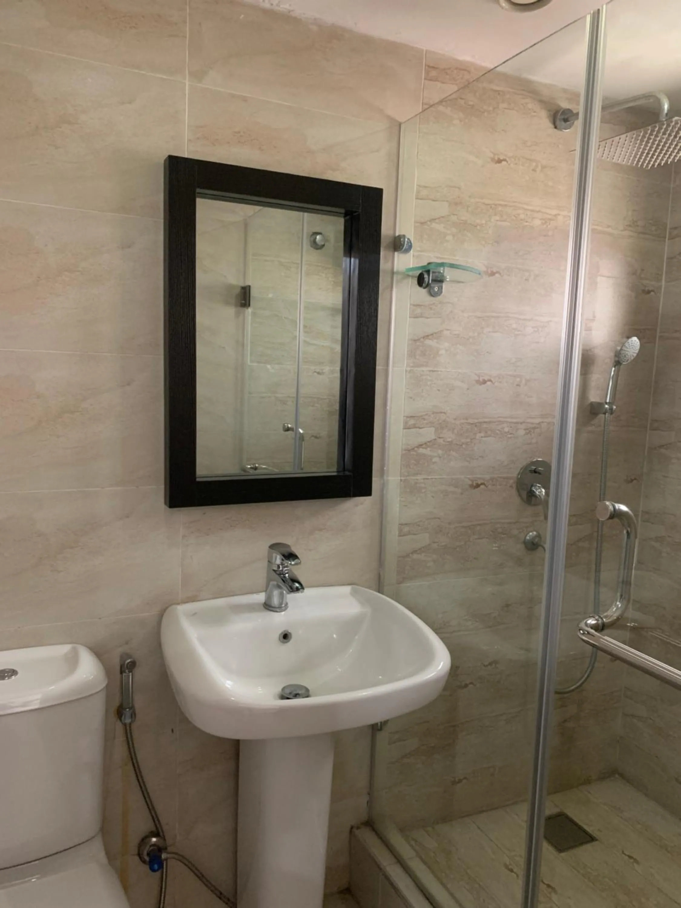 Shower in Emem Court - The Emem Apartment Collections