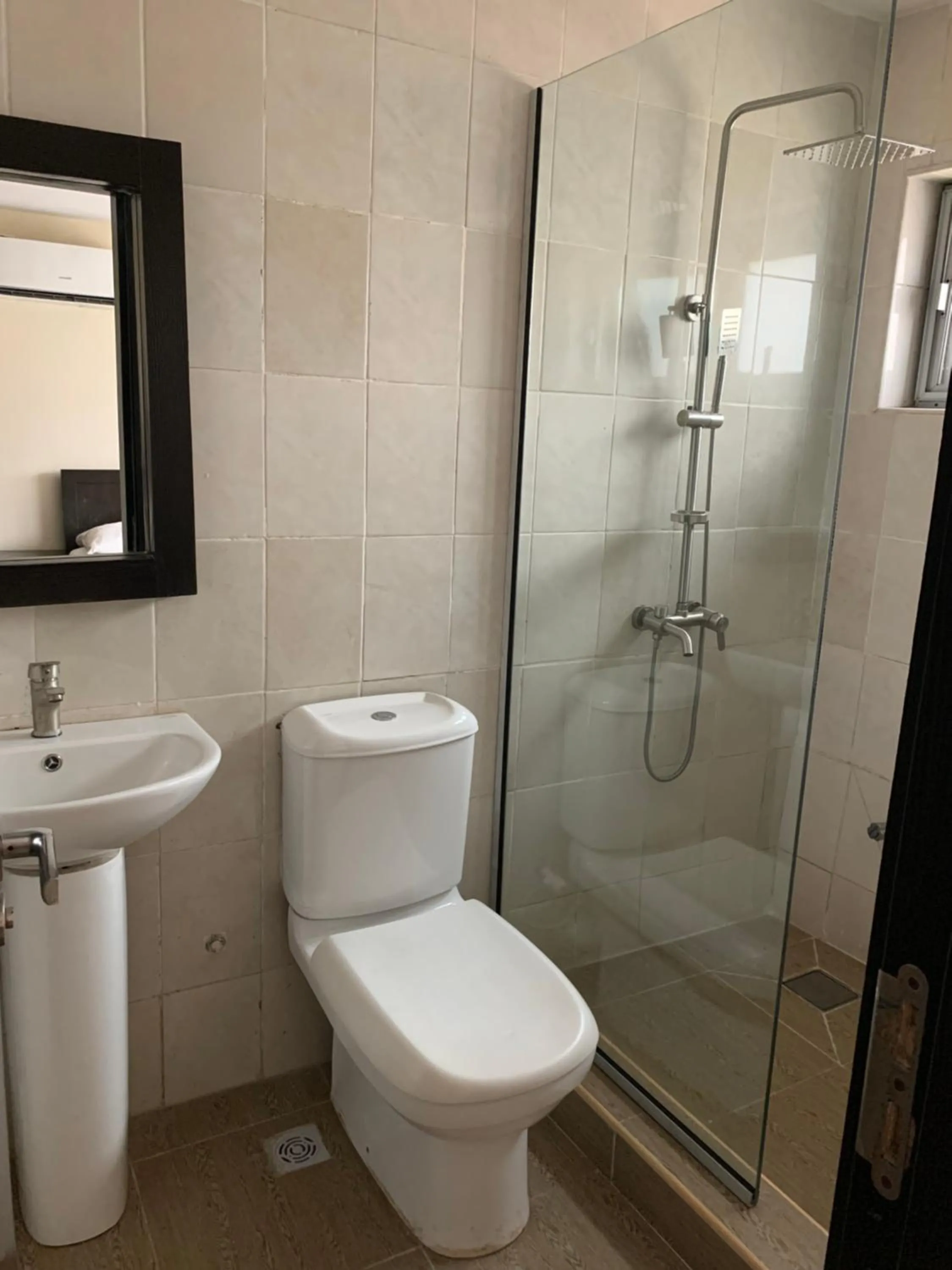 Shower in Emem Court - The Emem Apartment Collections