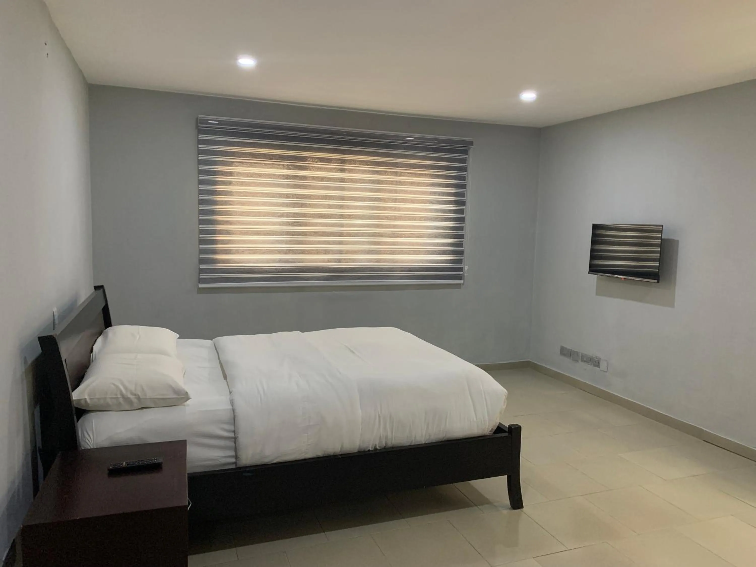 Bed in Emem Court - The Emem Apartment Collections