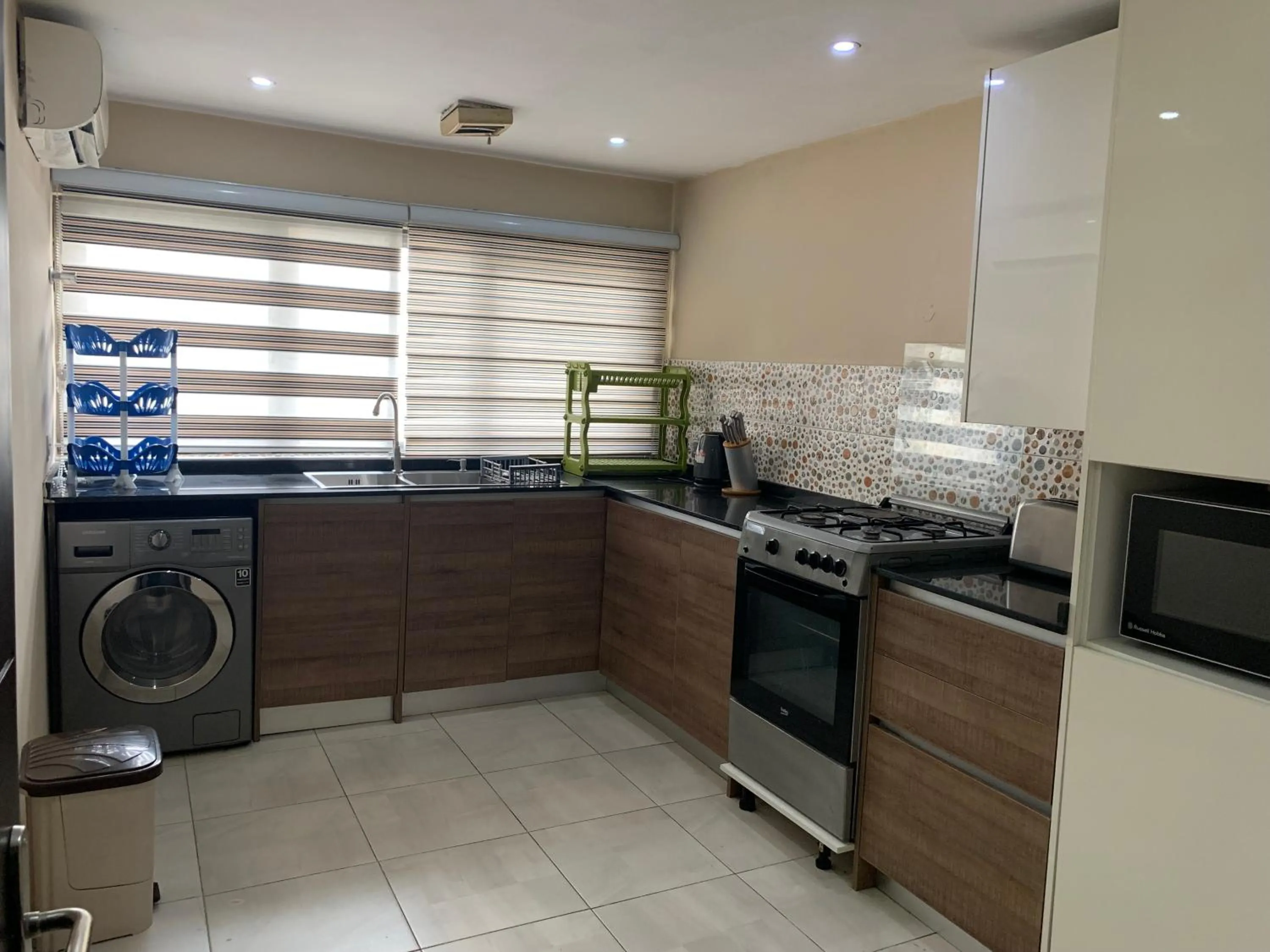 Kitchen or kitchenette in Emem Court - The Emem Apartment Collections