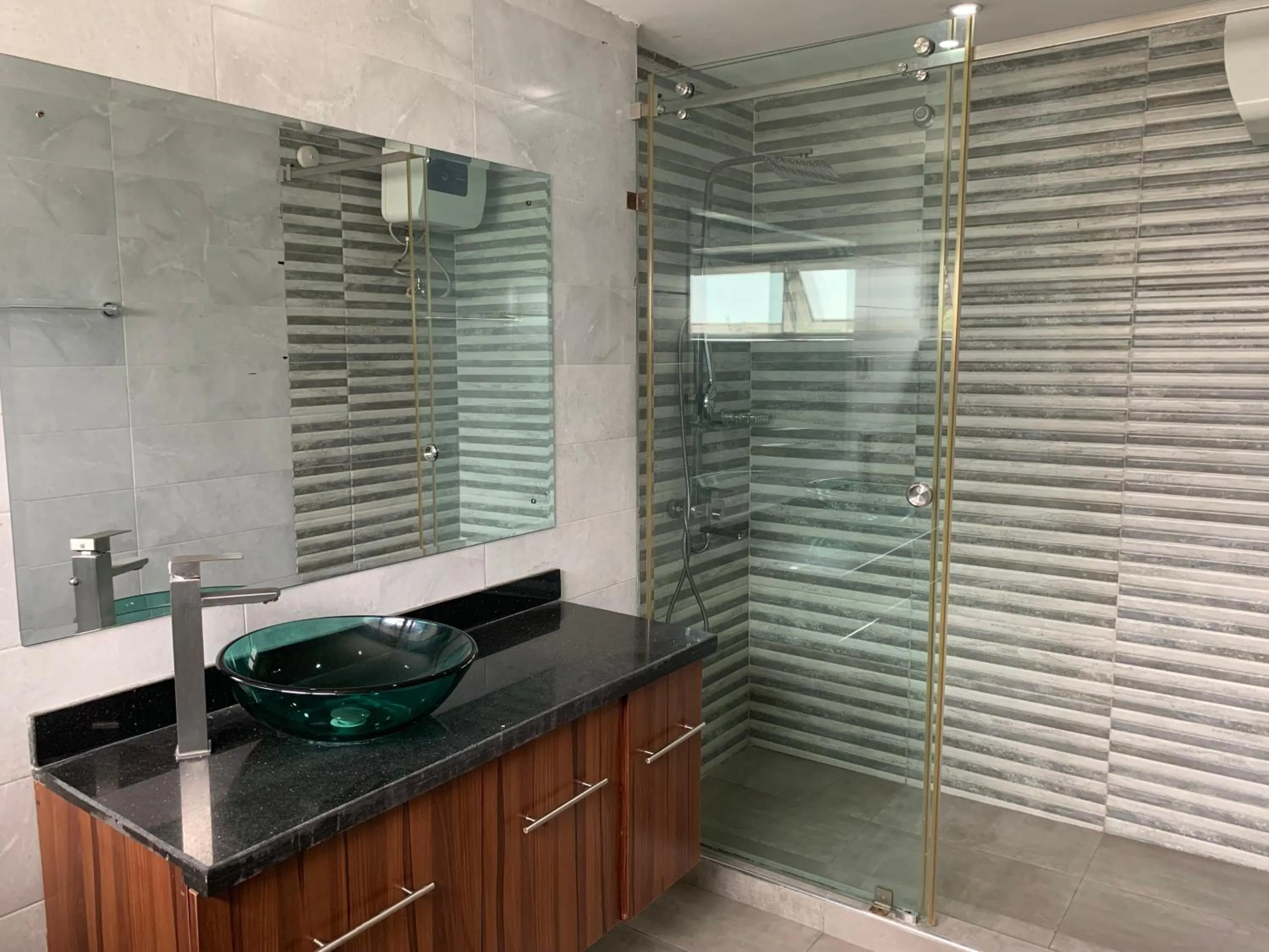Shower in Emem Court - The Emem Apartment Collections