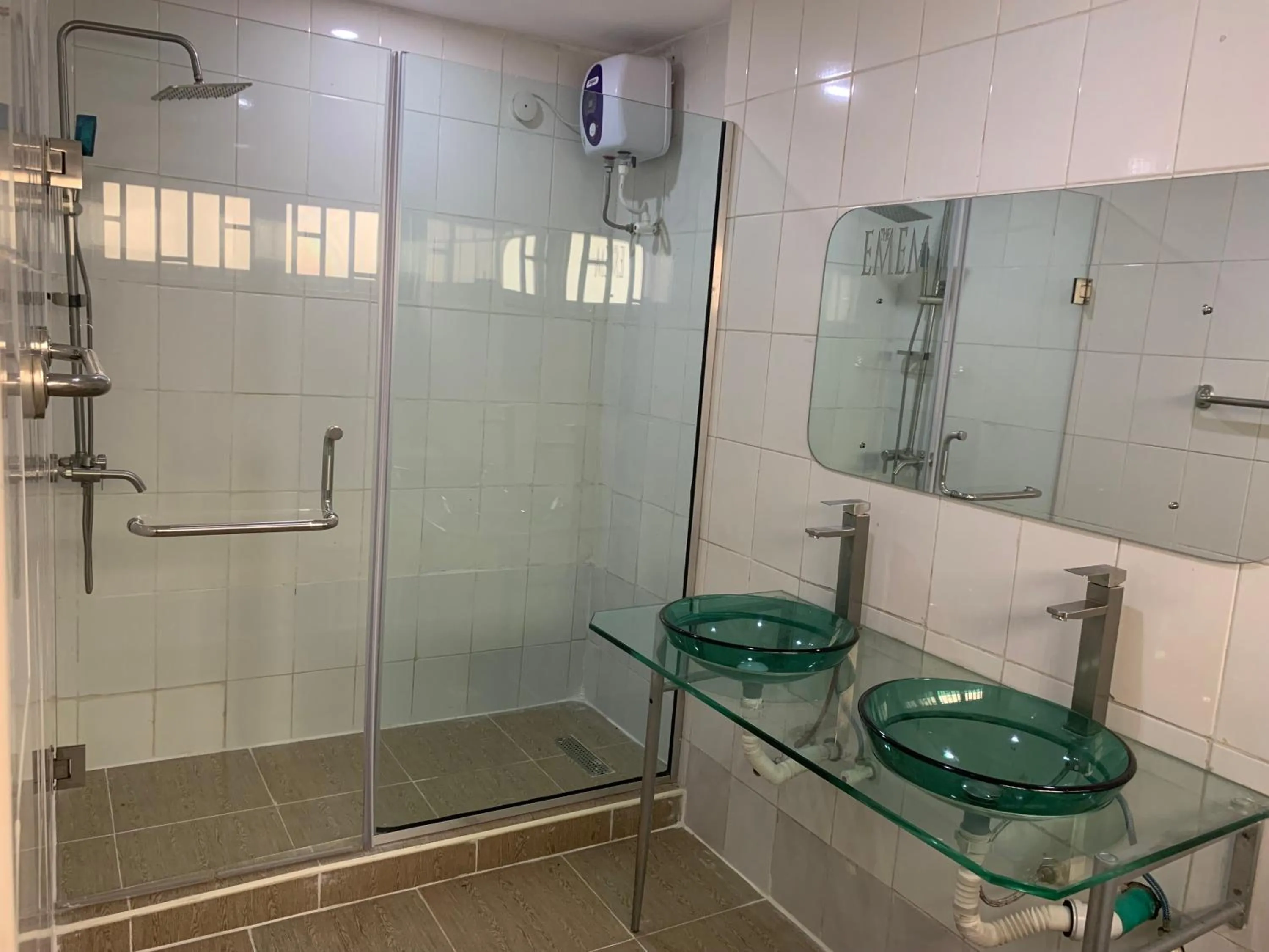 Shower in Emem Court - The Emem Apartment Collections