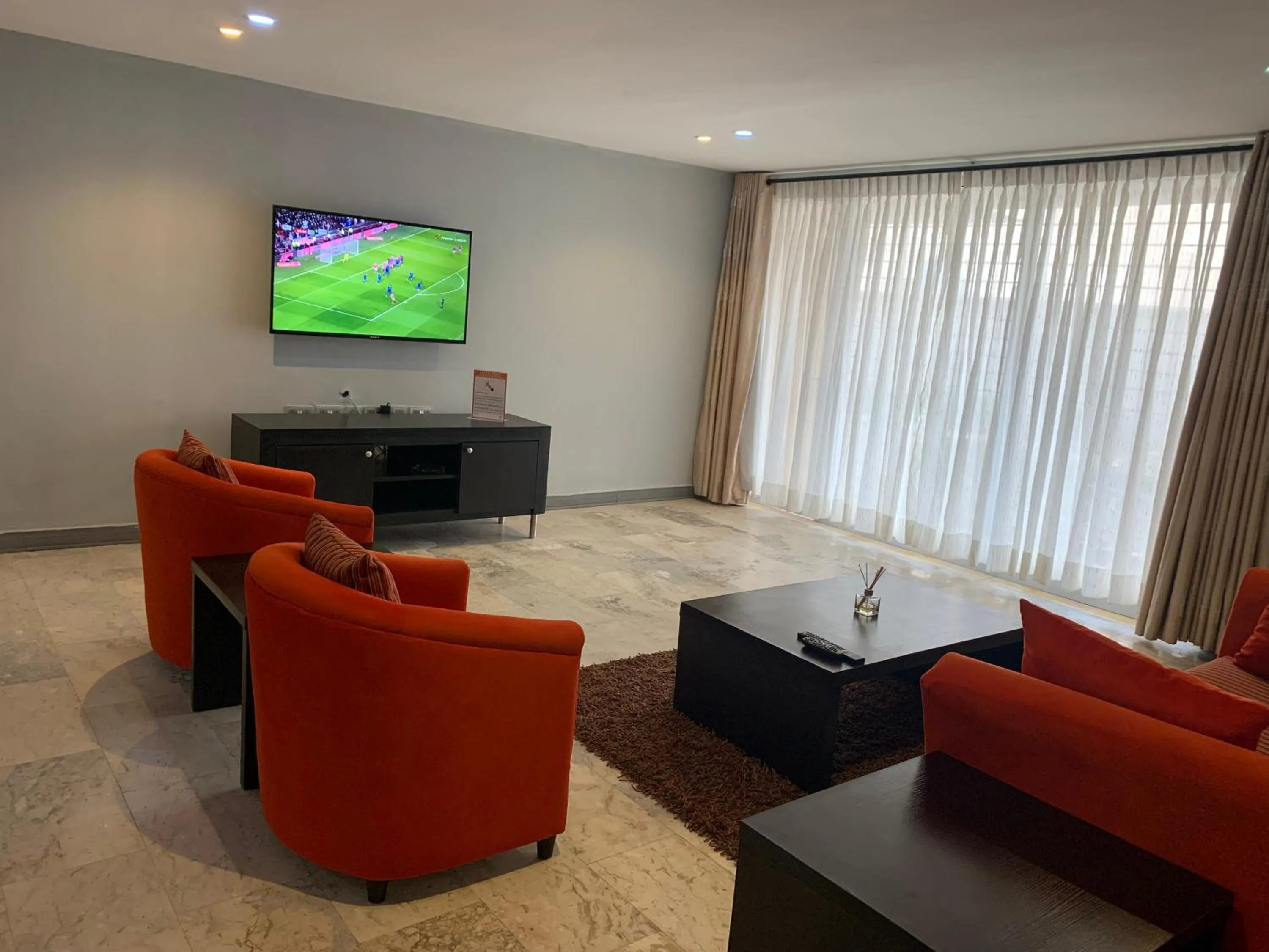 TV and multimedia in Emem Court - The Emem Apartment Collections