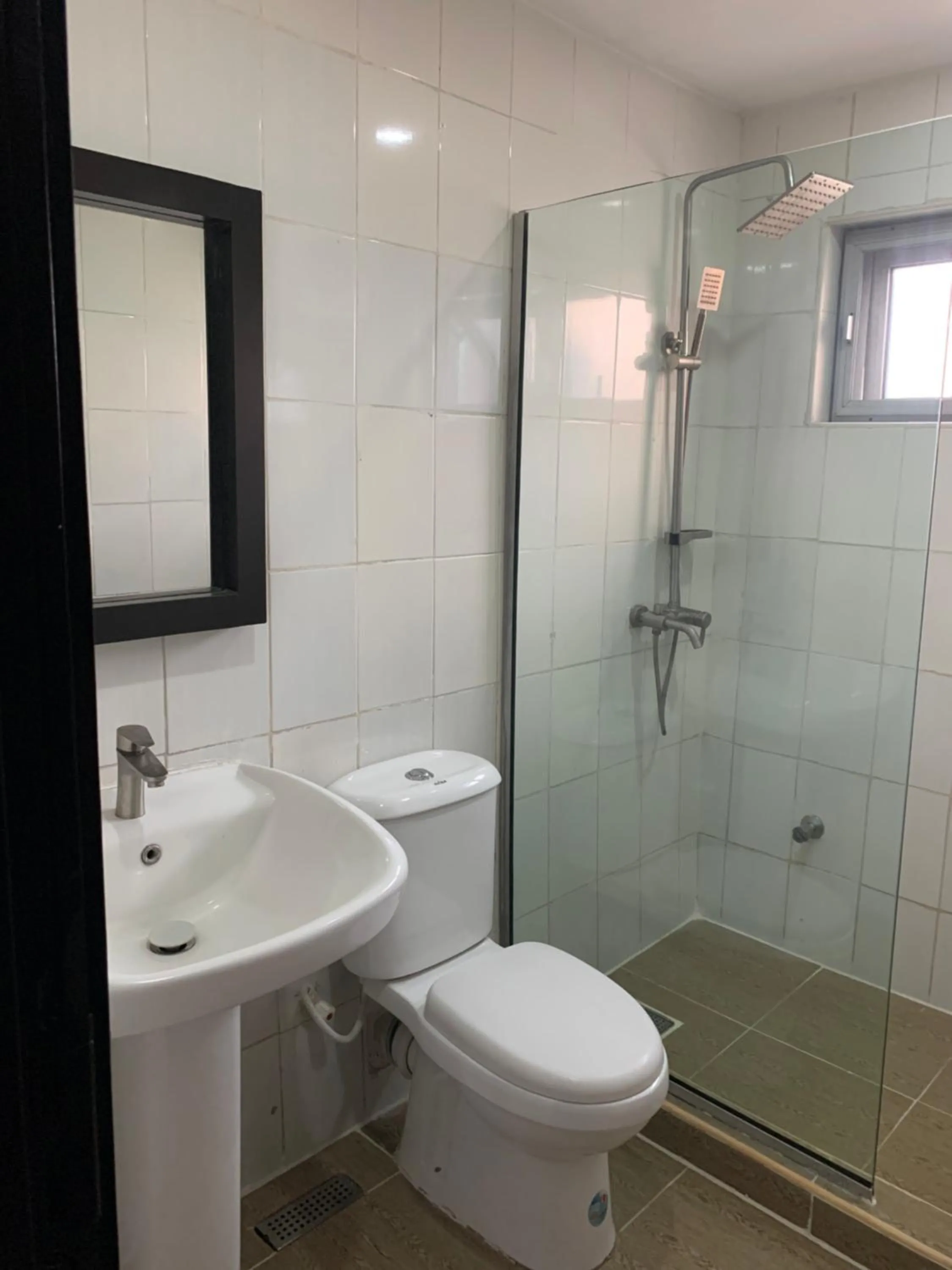 Shower in Emem Court - The Emem Apartment Collections