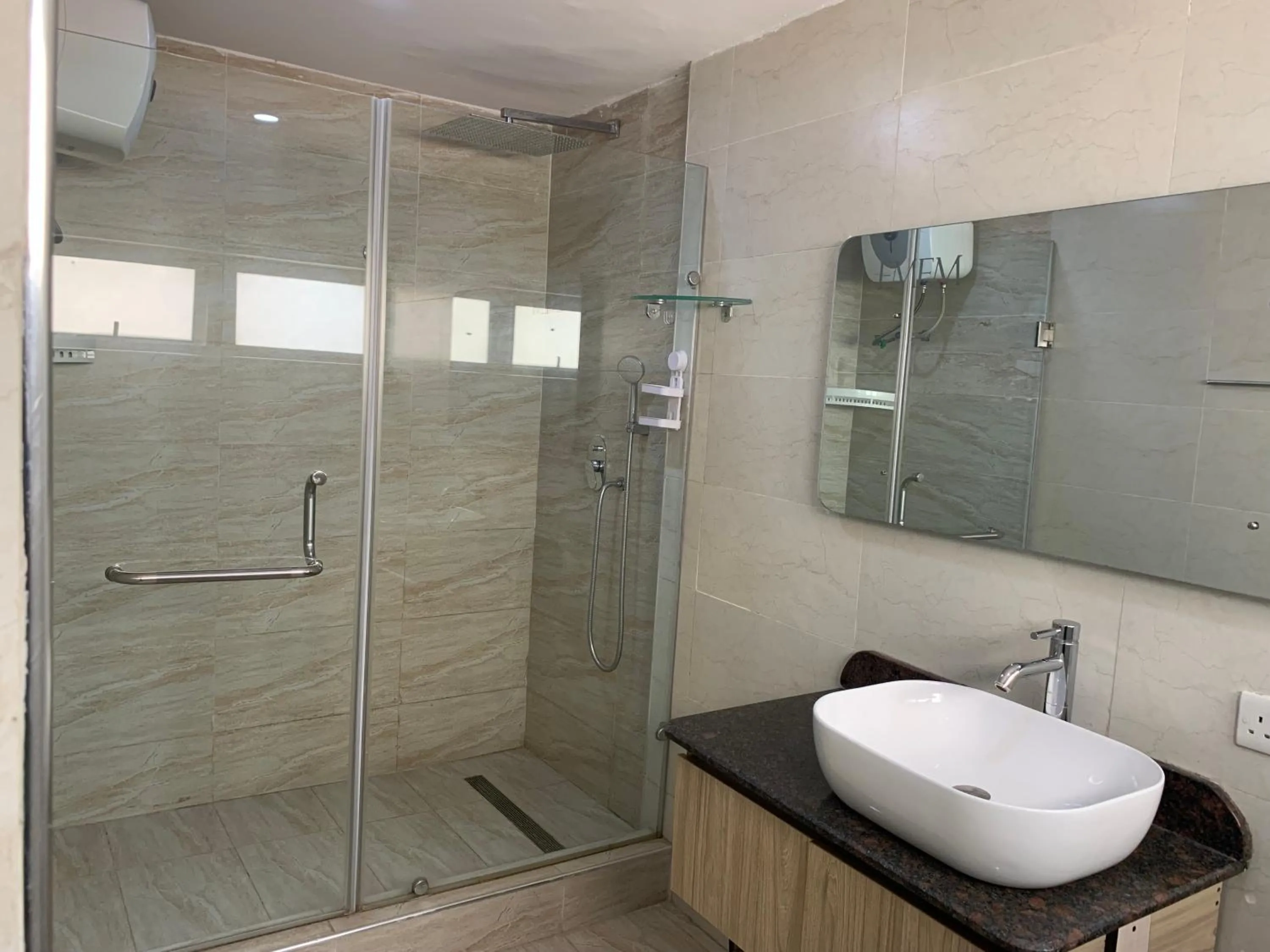 Shower in Emem Court - The Emem Apartment Collections